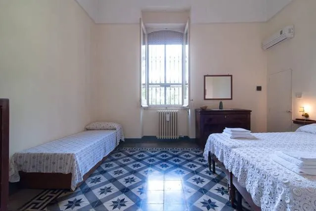 Photo of the whole room, Bed in Il Giardino casa vacanze