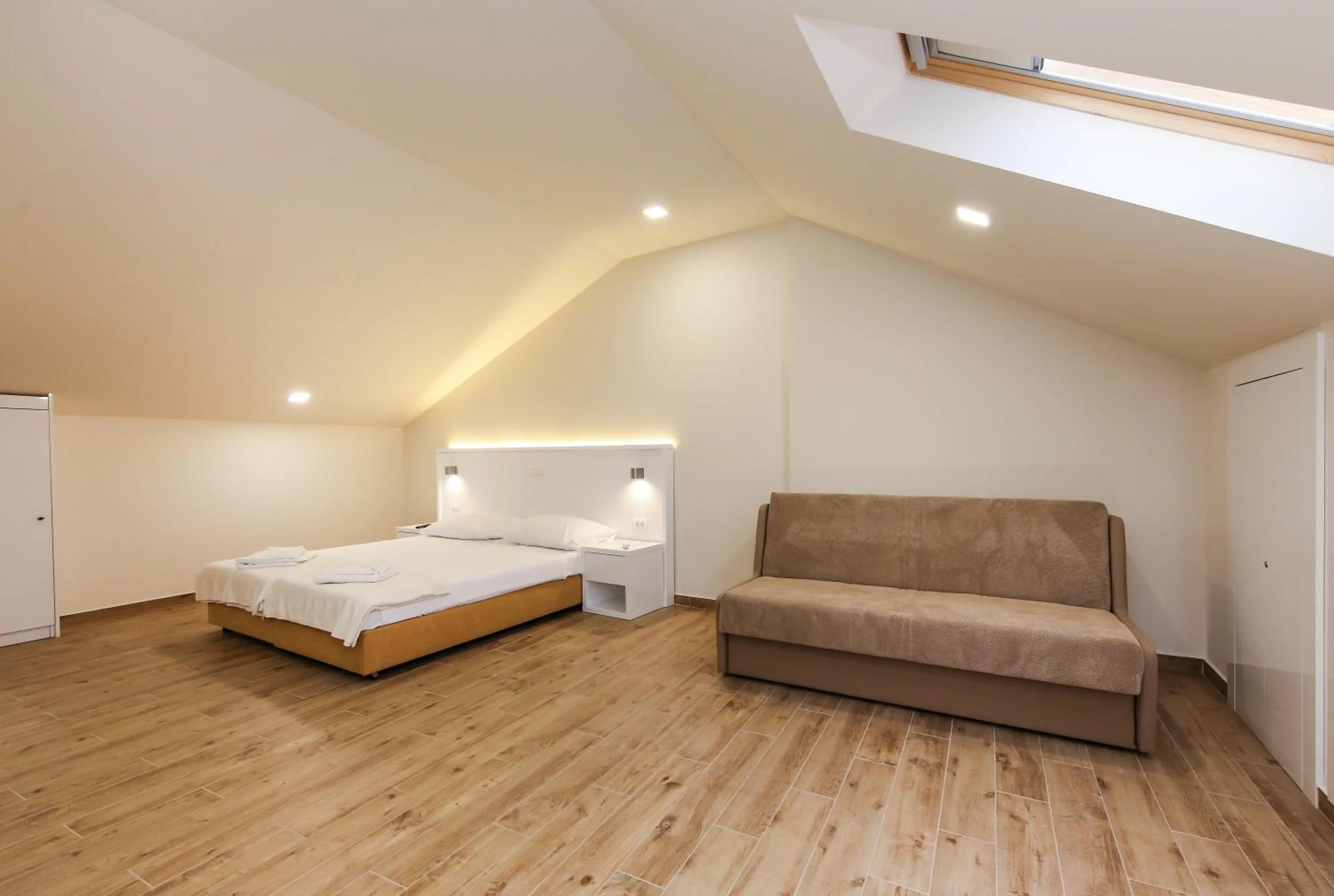 Double Room with two Extra Beds in Idassa Atrium rooms