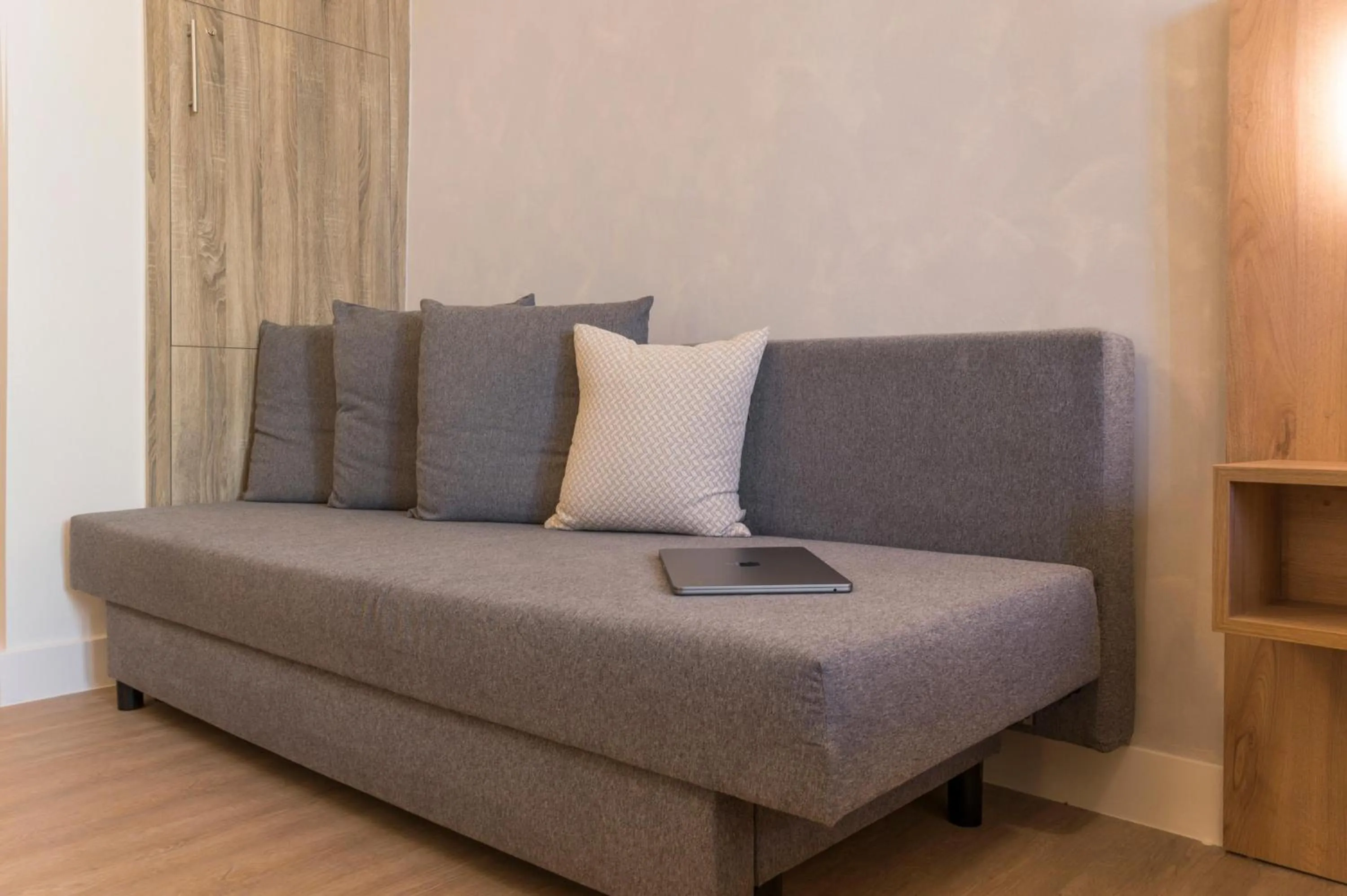 Seating area, Bed in Porto Orion Studios