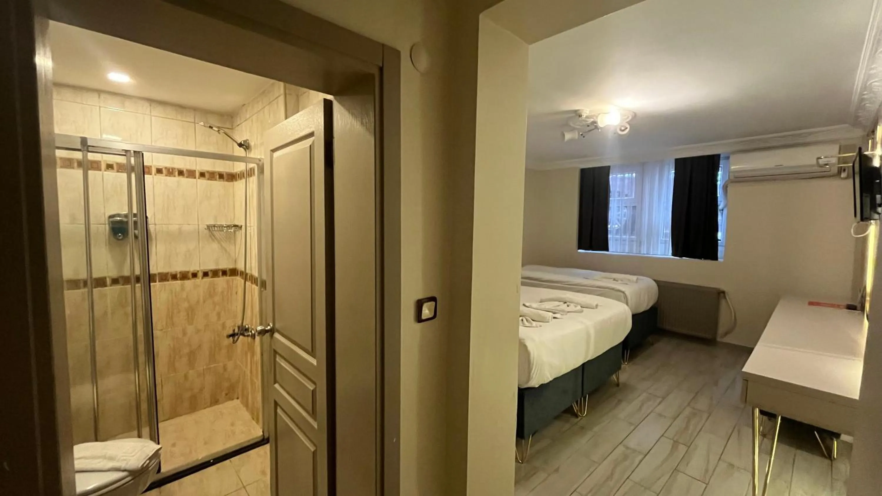 Bed in Hotel Tulip House