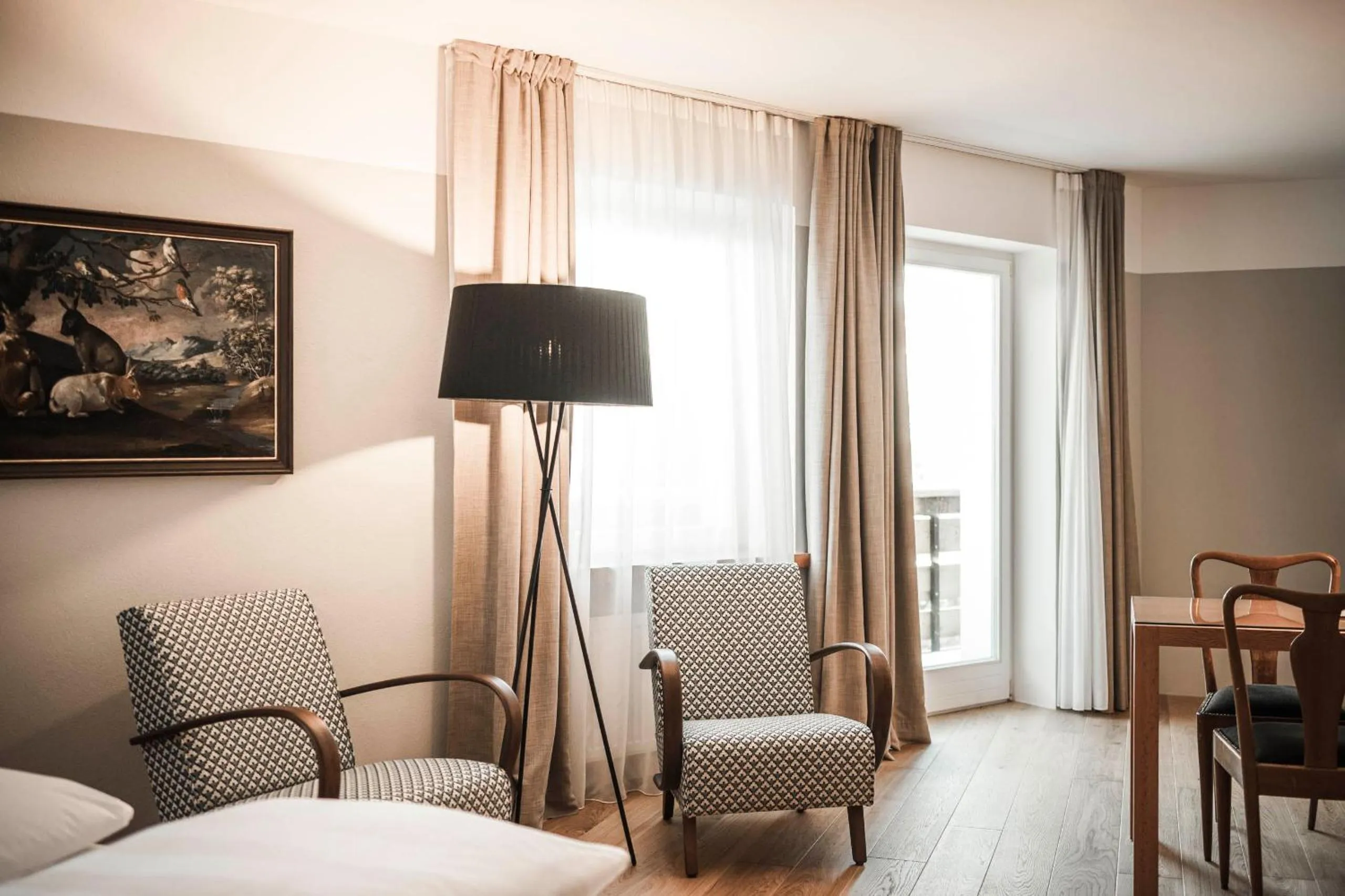 Seating area, Bed in Boutique & Gourmet Hotel Orso Grigio - Grauer Bär