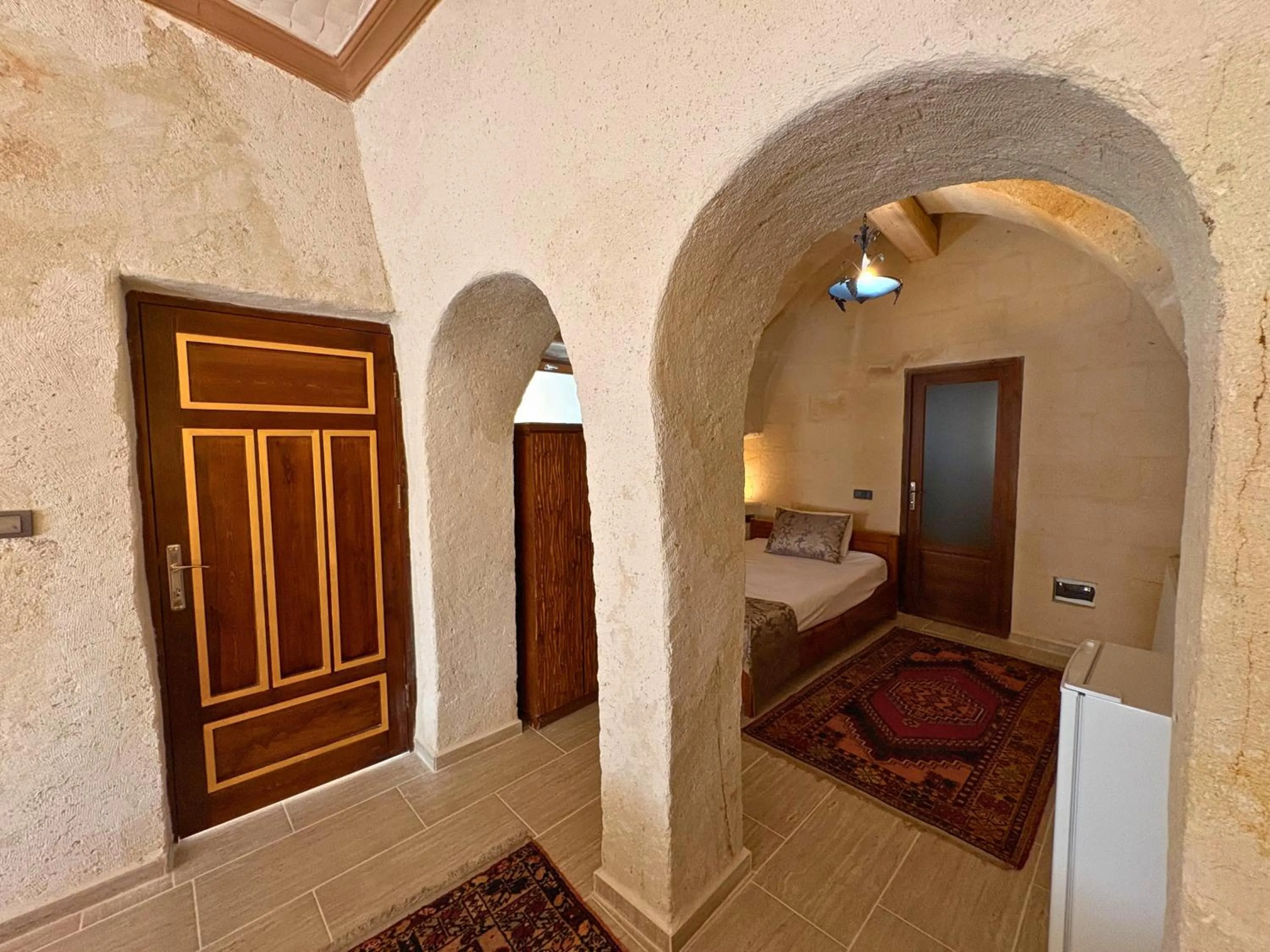 Bed in Elysee Cave House