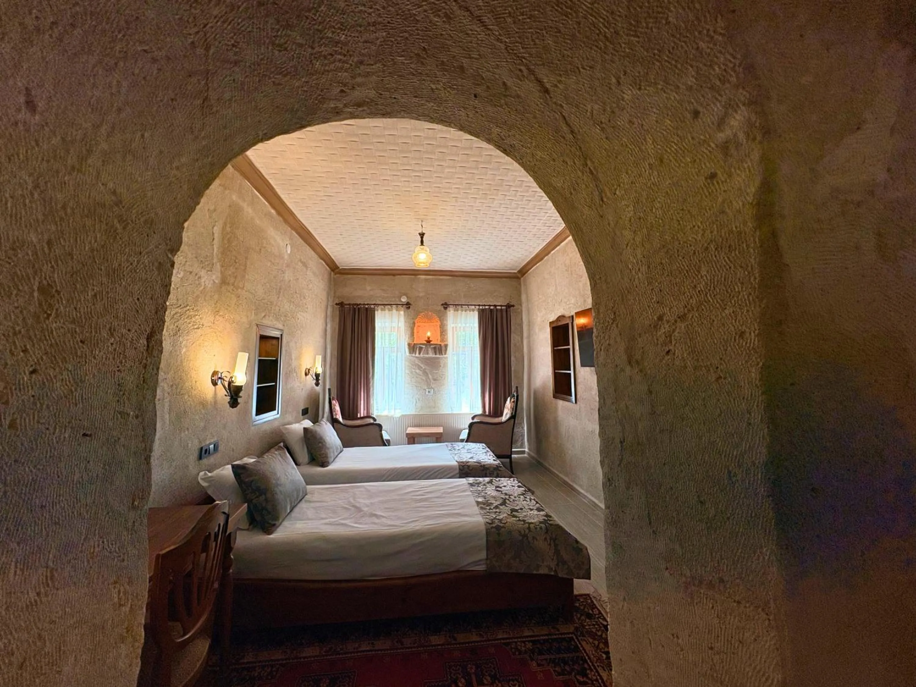 Bed in Elysee Cave House