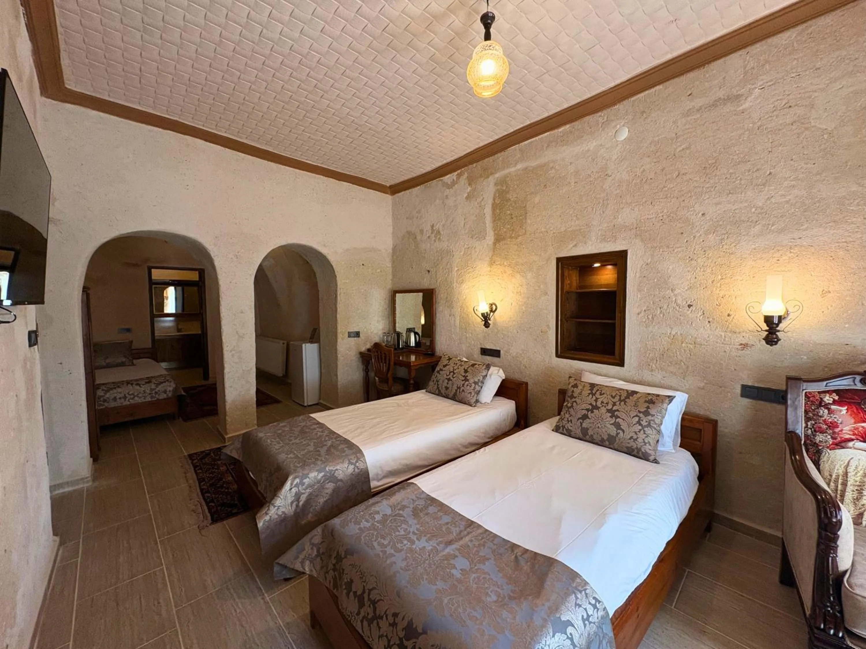 Bed in Elysee Cave House