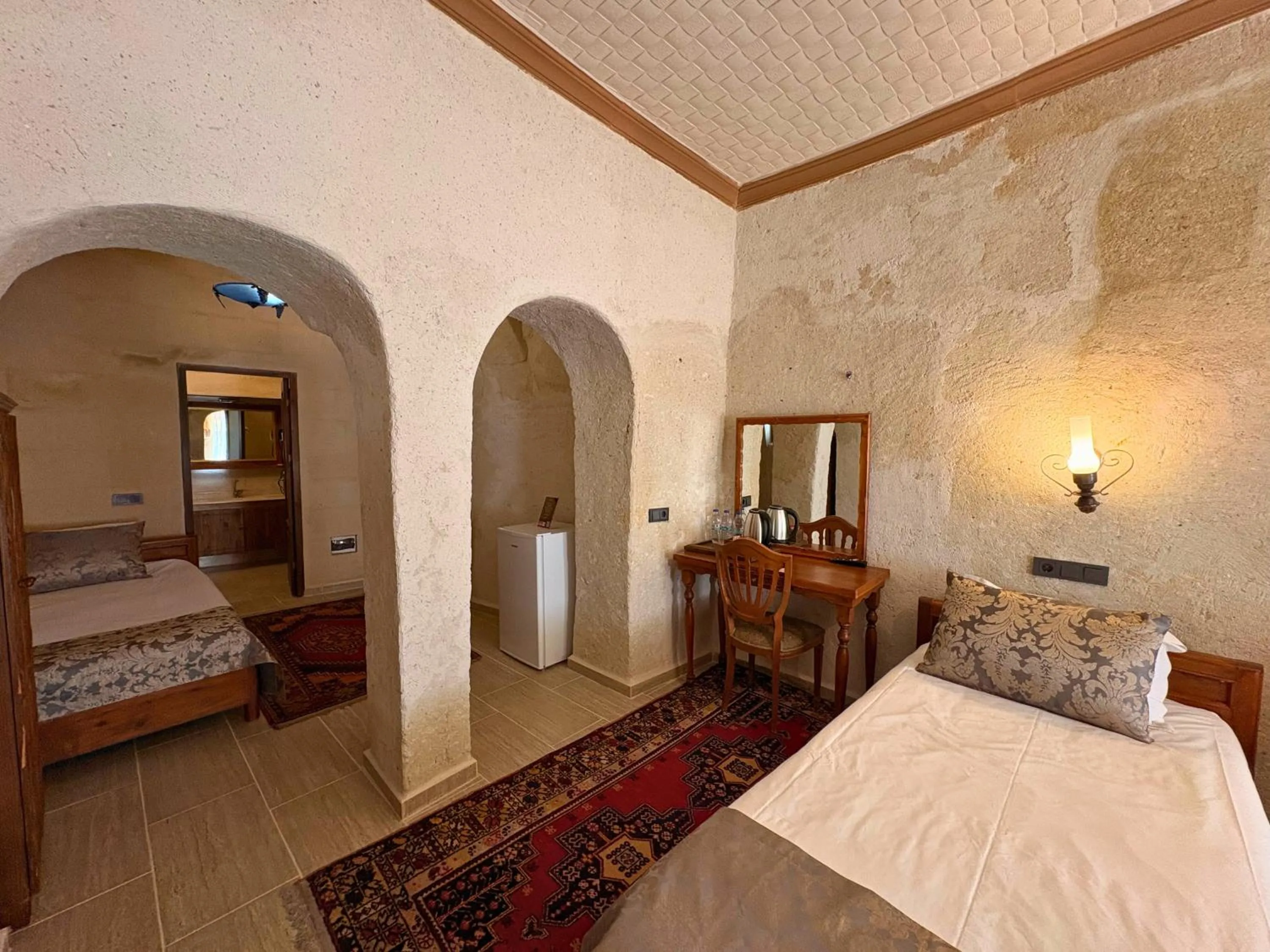 Bed in Elysee Cave House