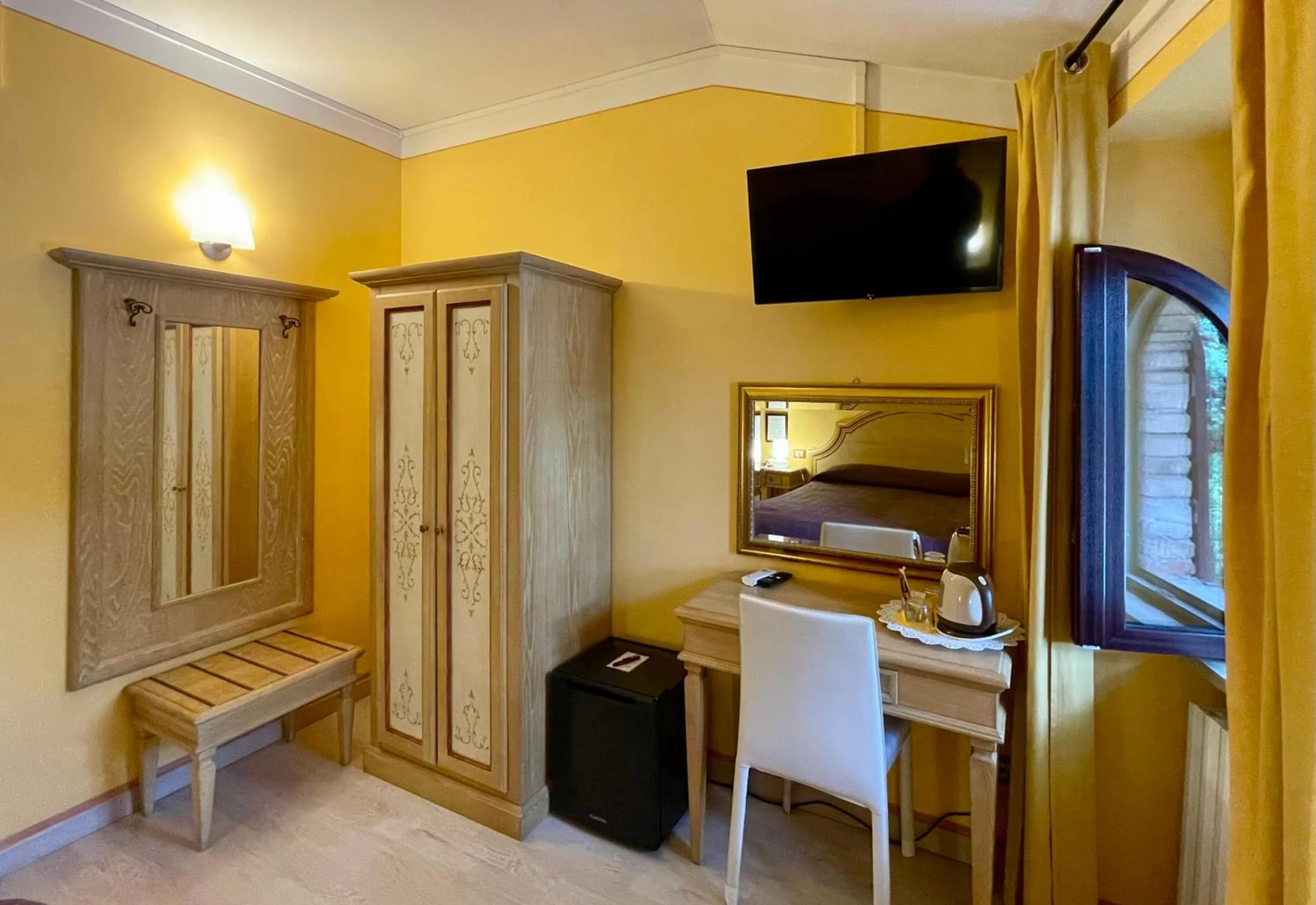 Bedroom, TV/Entertainment Center in Hotel Berti