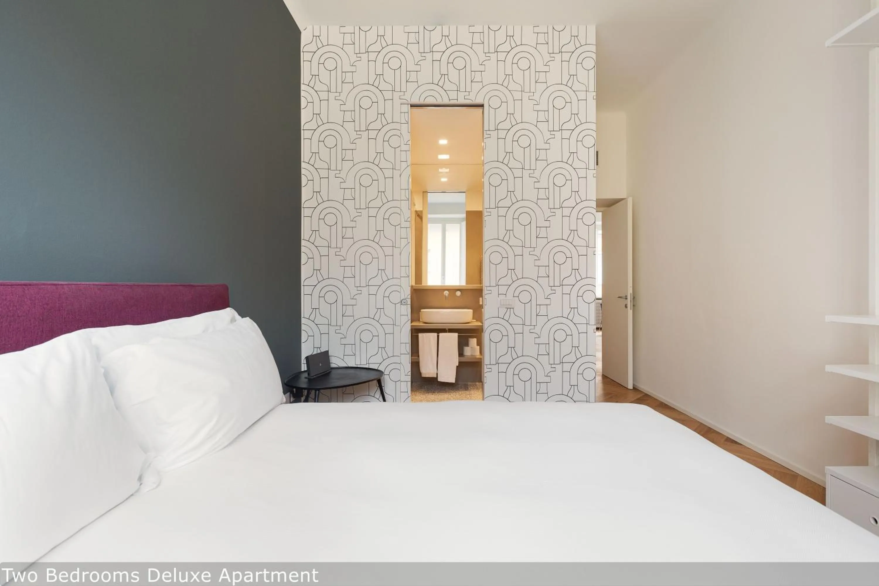 Bed in Brera Apartments in San Fermo