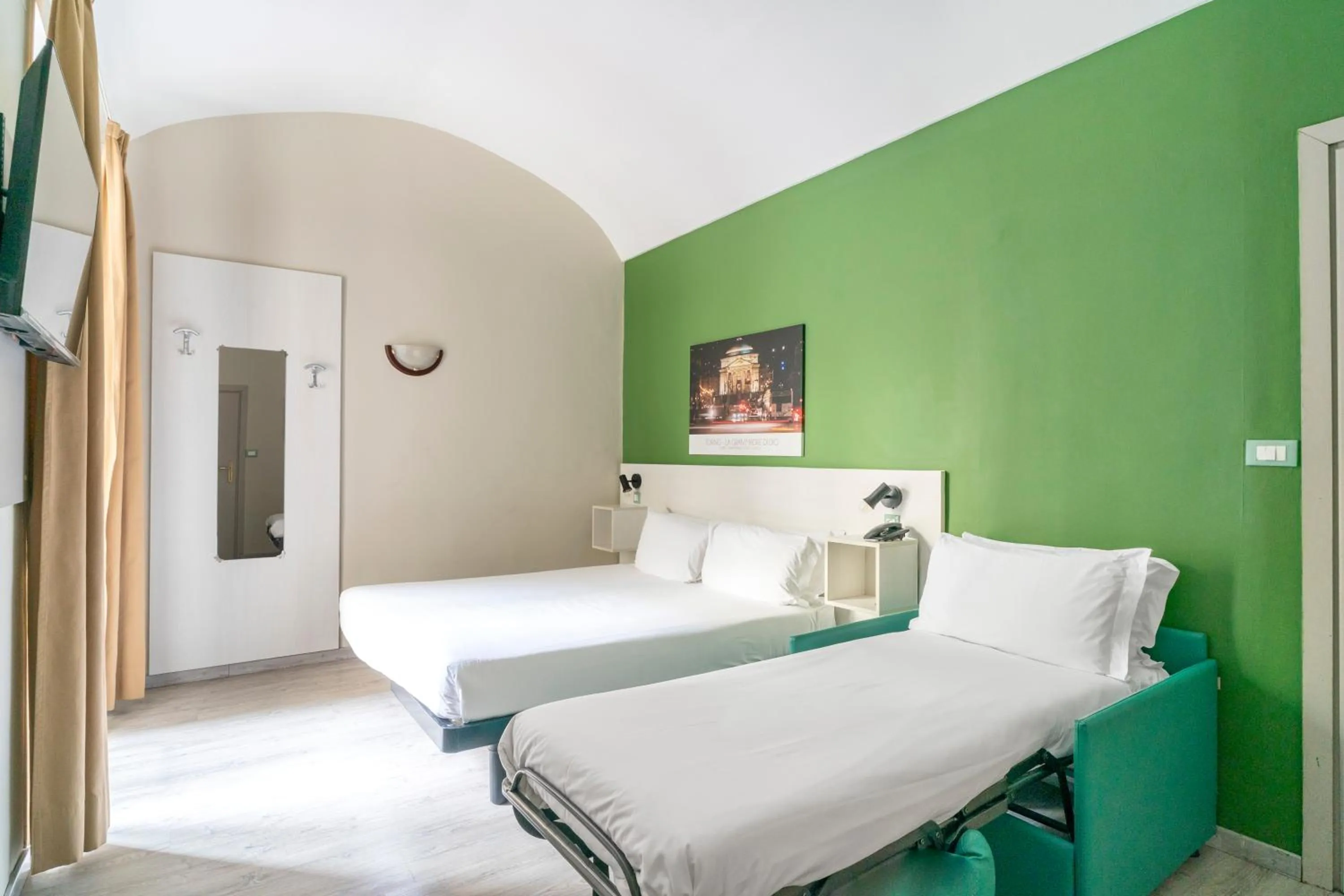 Bed in Hotel Astoria