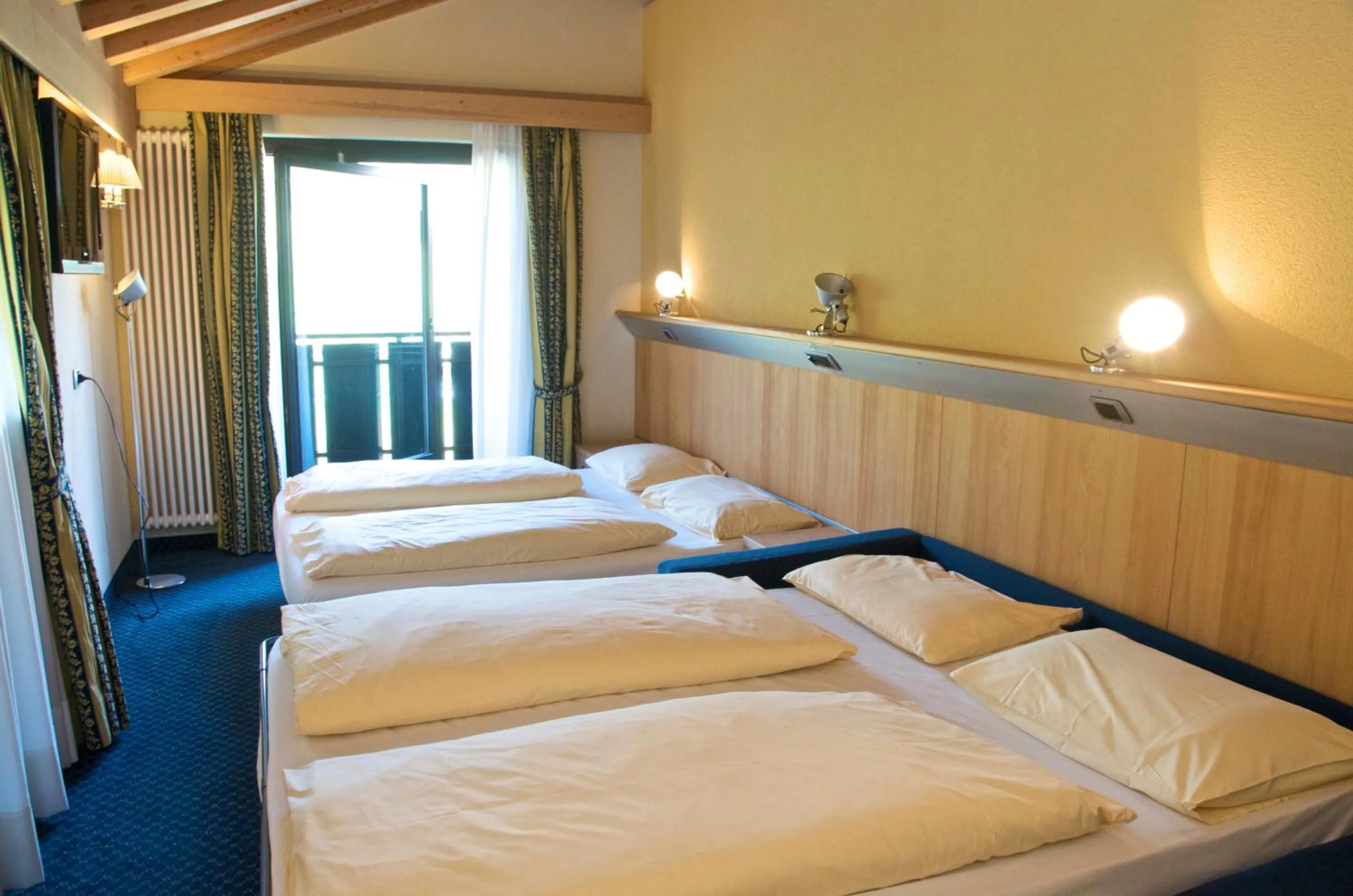 Comfort Family Room (2 Adults + 2 Children) in Alexander Charme Hotel