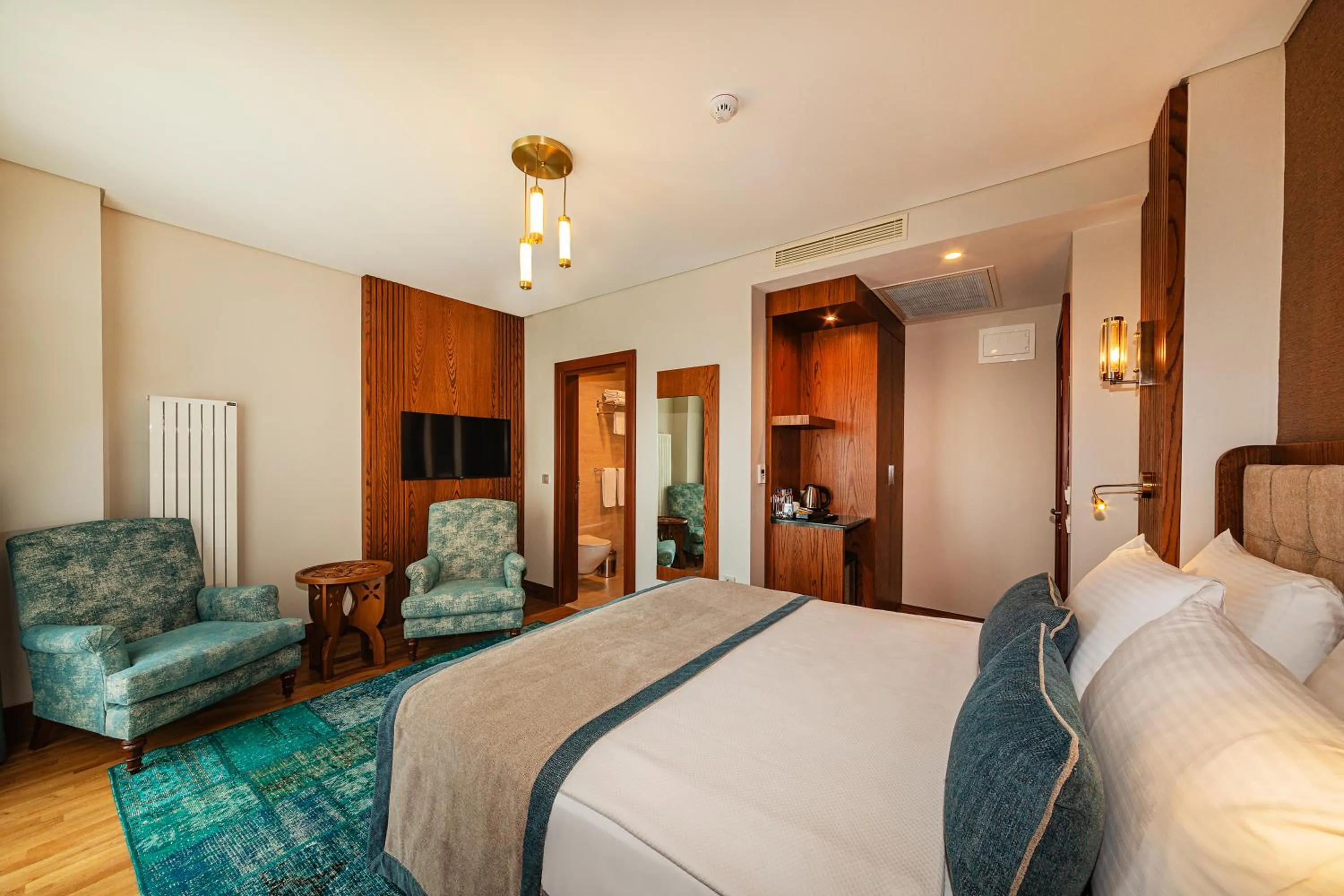 TV and multimedia, Bed in Triton Hotel