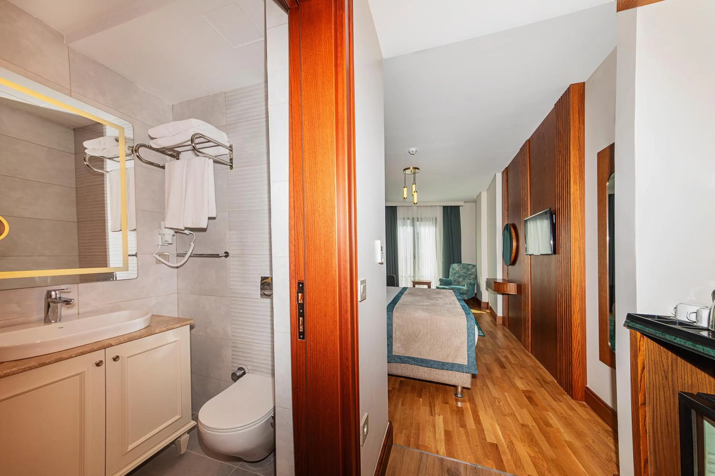 Toilet in Triton Hotel