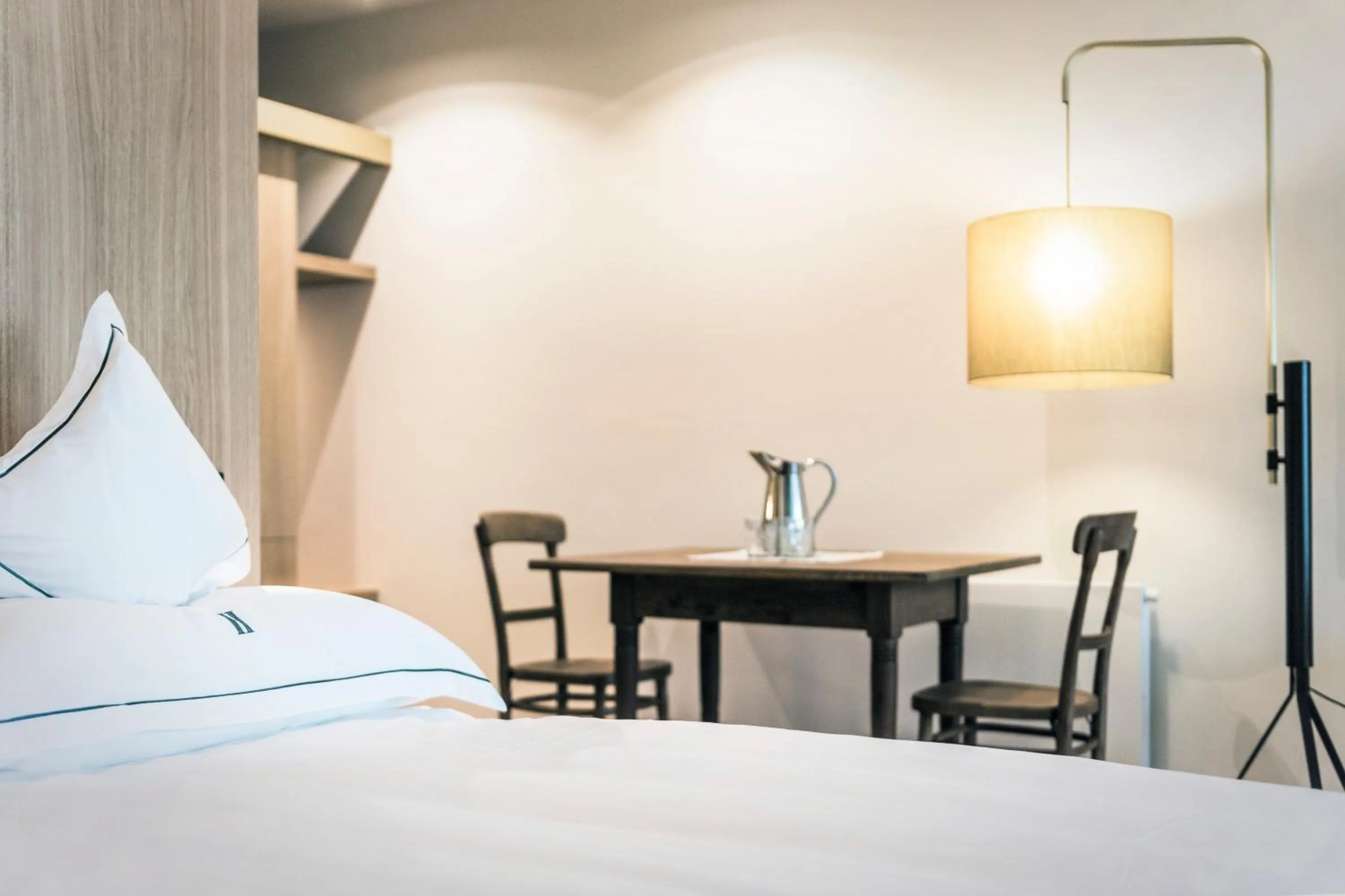 Bed in Parkhotel Holzner