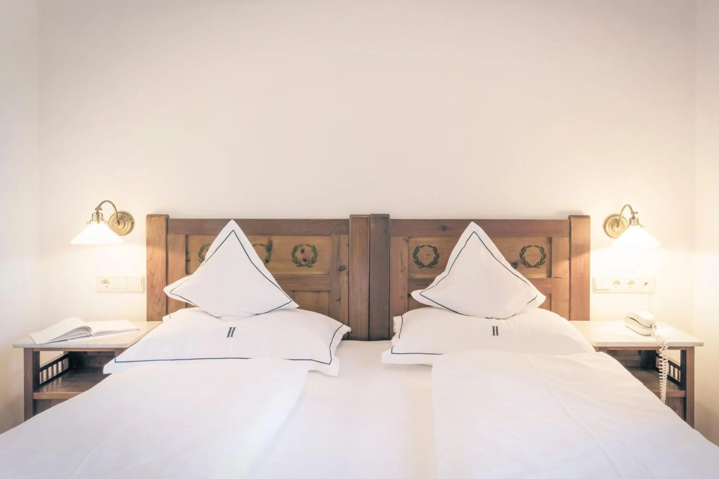 Bed in Parkhotel Holzner