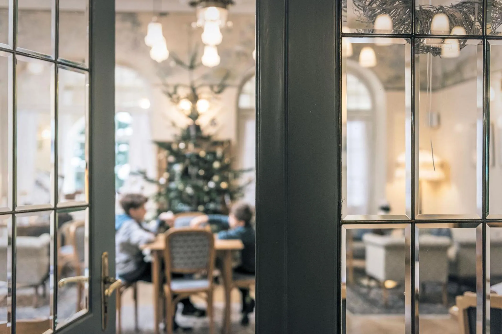 Communal lounge/ TV room in Parkhotel Holzner