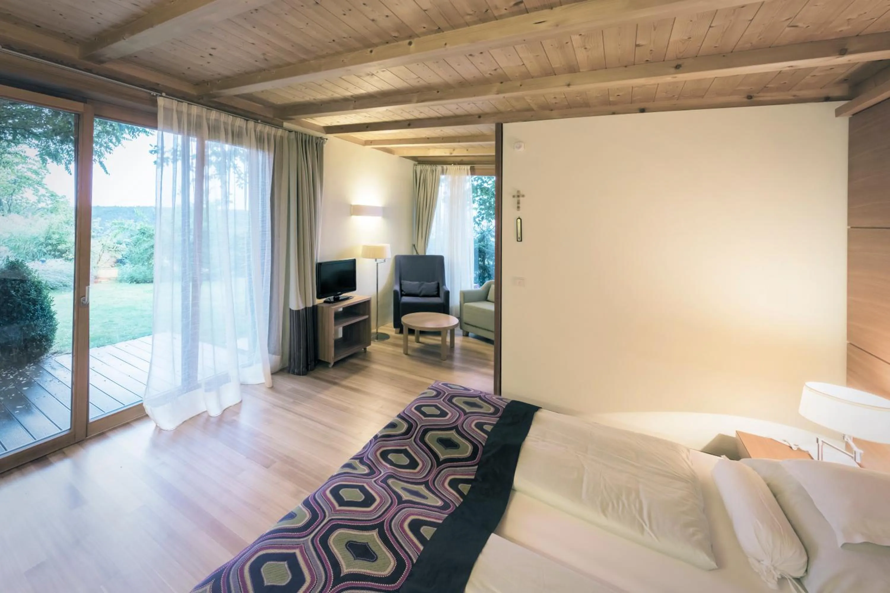 Bed in Parkhotel Holzner