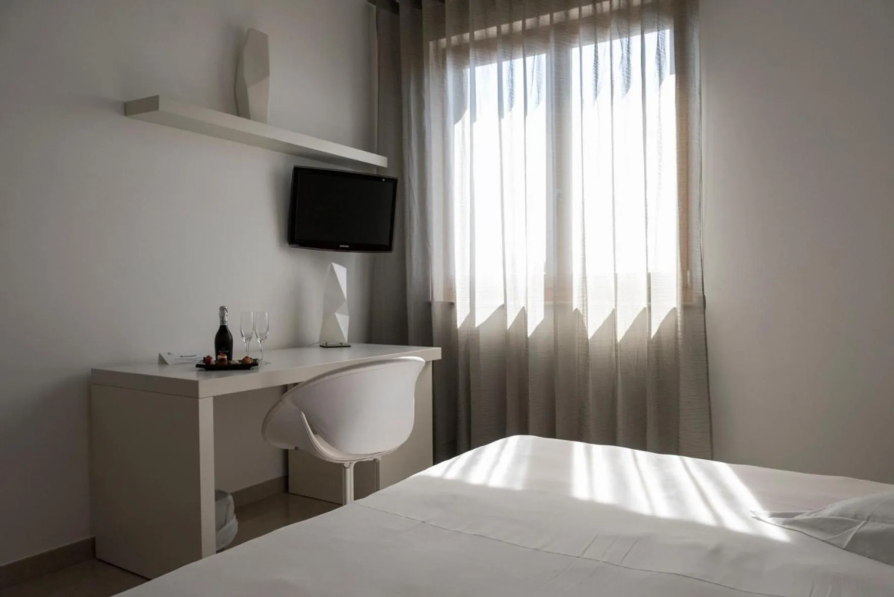 TV and multimedia, Bed in Pietre Nere Resort & Spa
