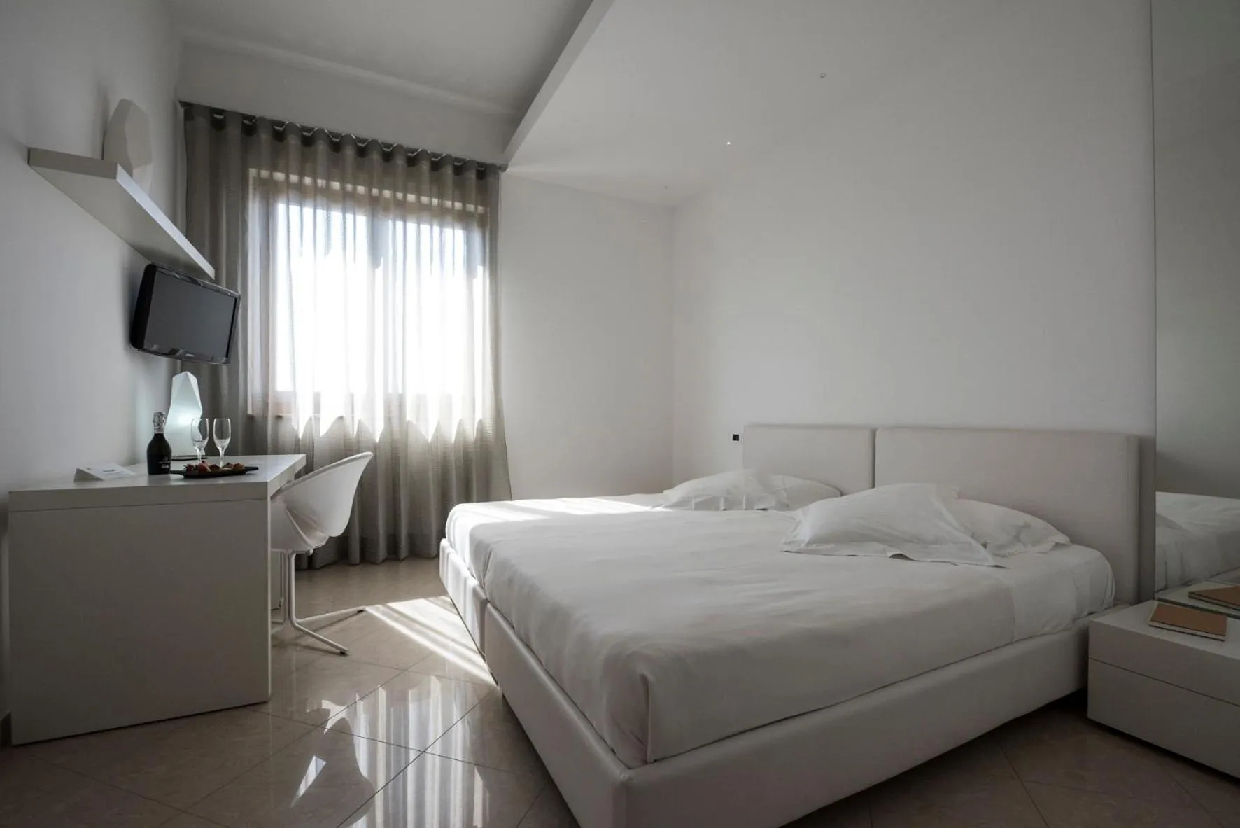 Bed in Pietre Nere Resort & Spa