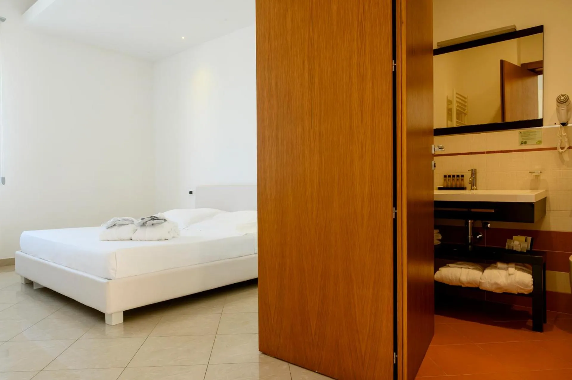 Bathroom, Bed in Pietre Nere Resort & Spa