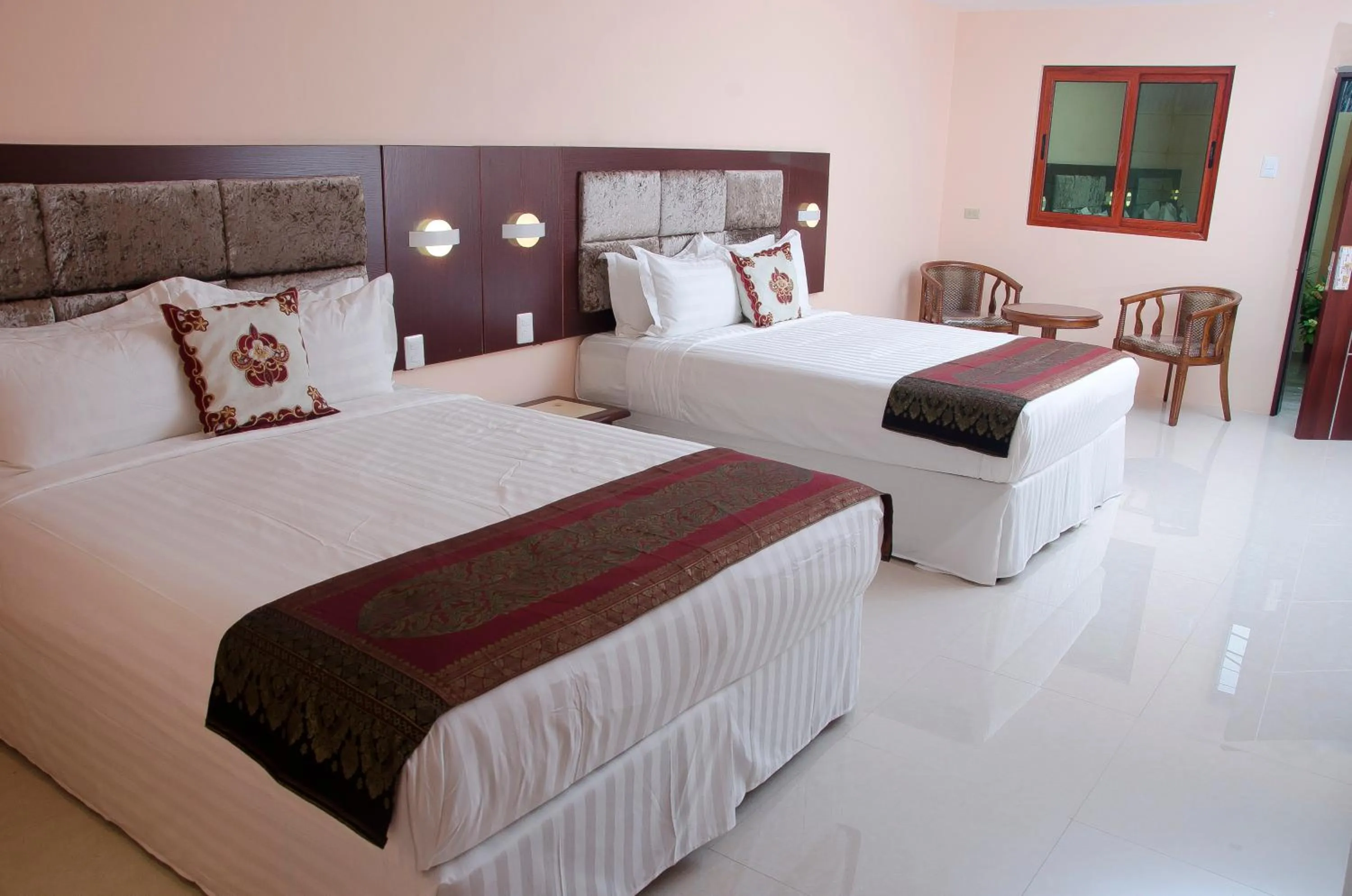 Bed in Grand Diamond Hotel Trinidad