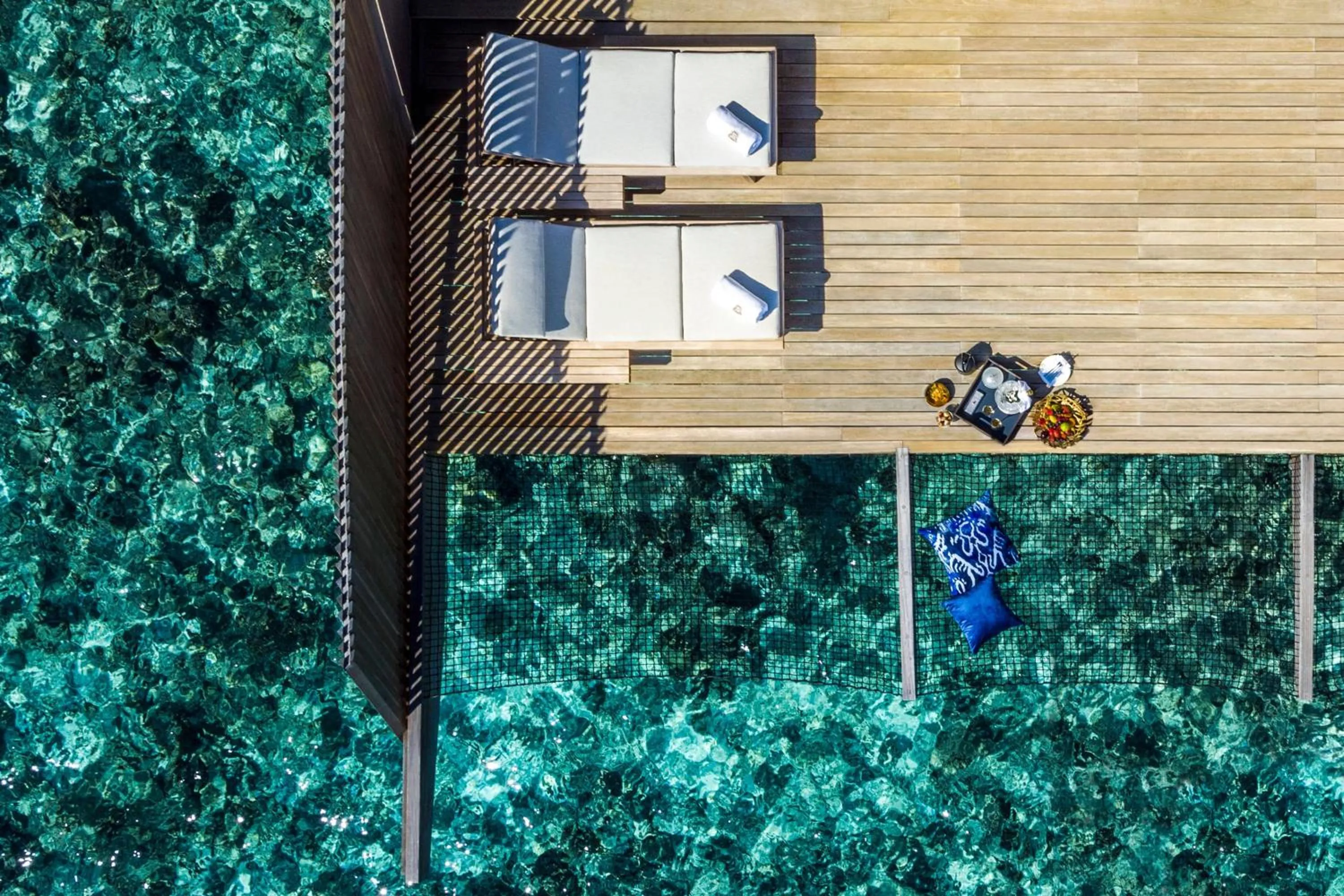 Swimming pool in The St. Regis Maldives Vommuli Resort