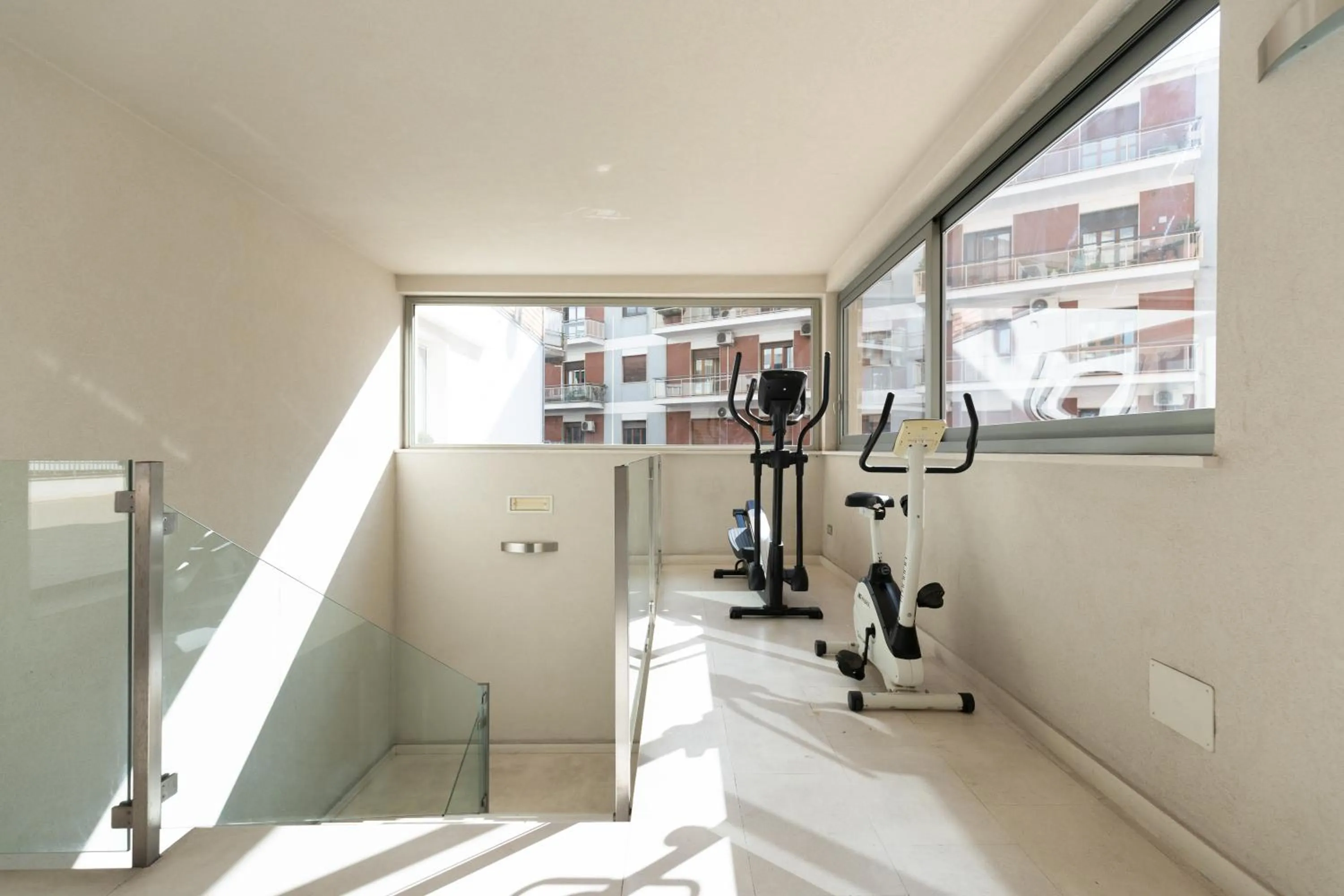 Fitness centre/facilities in Home 15 Residence Hotel