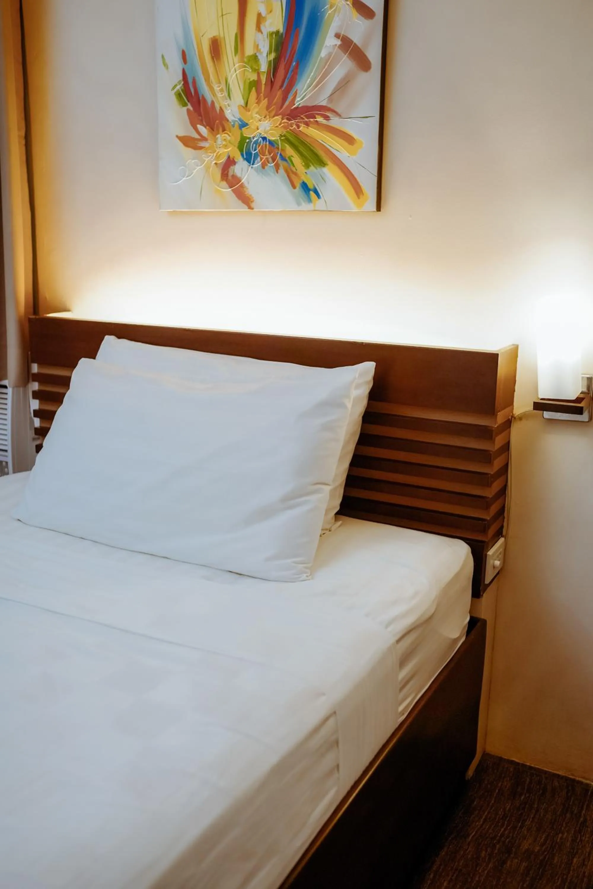 Bed in Emerald Boutique Hotel