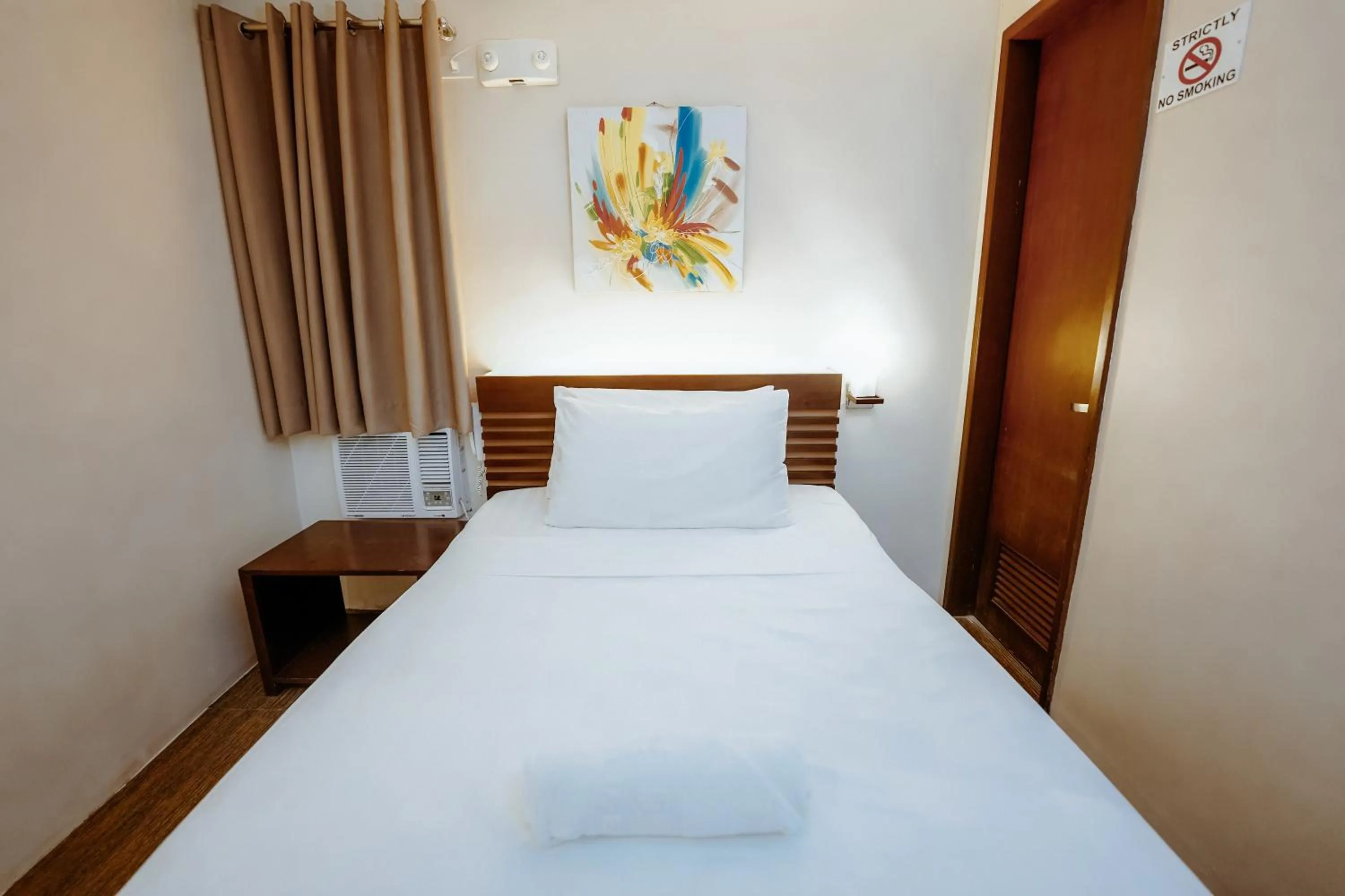 Bed in Emerald Boutique Hotel