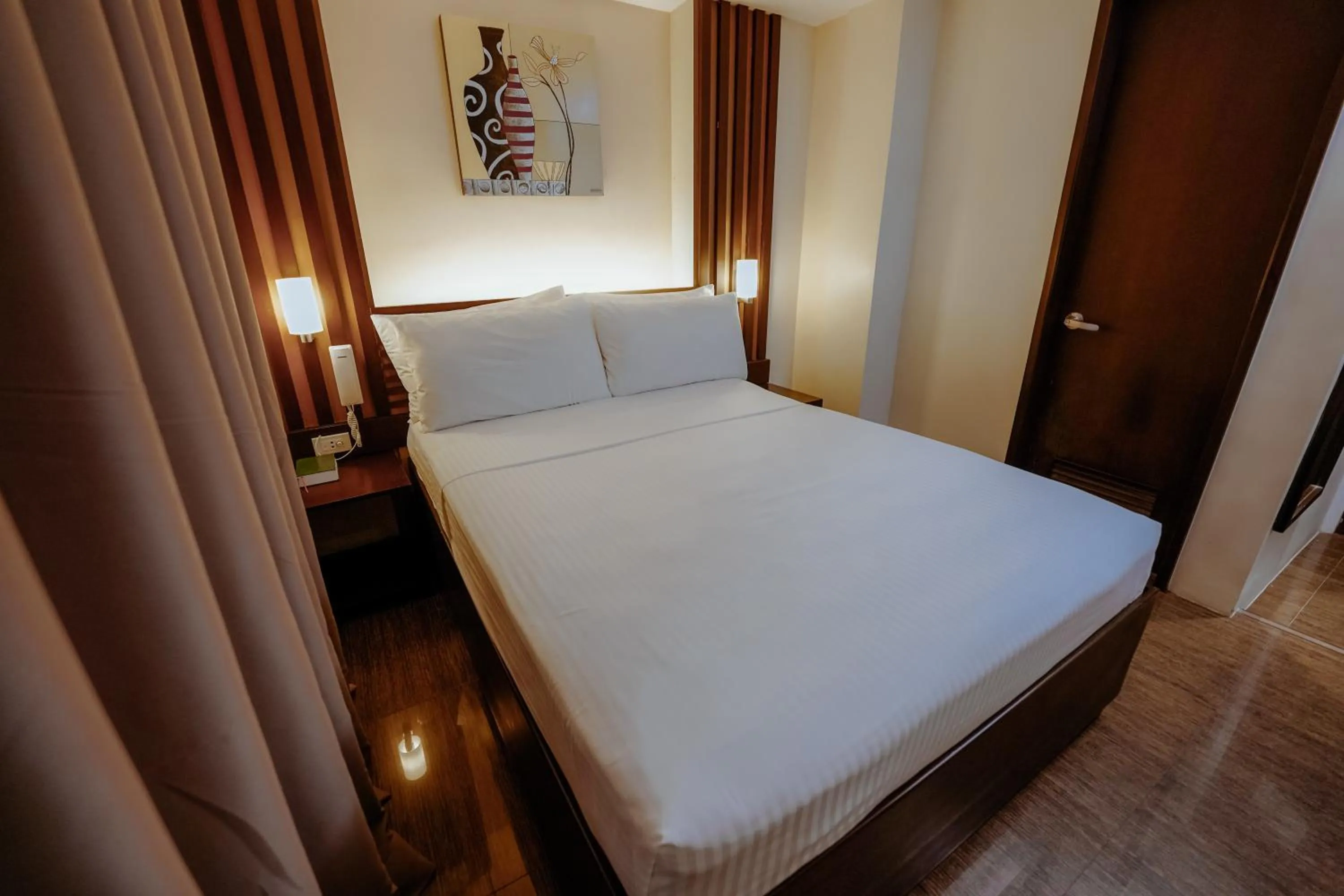 Bed in Emerald Boutique Hotel