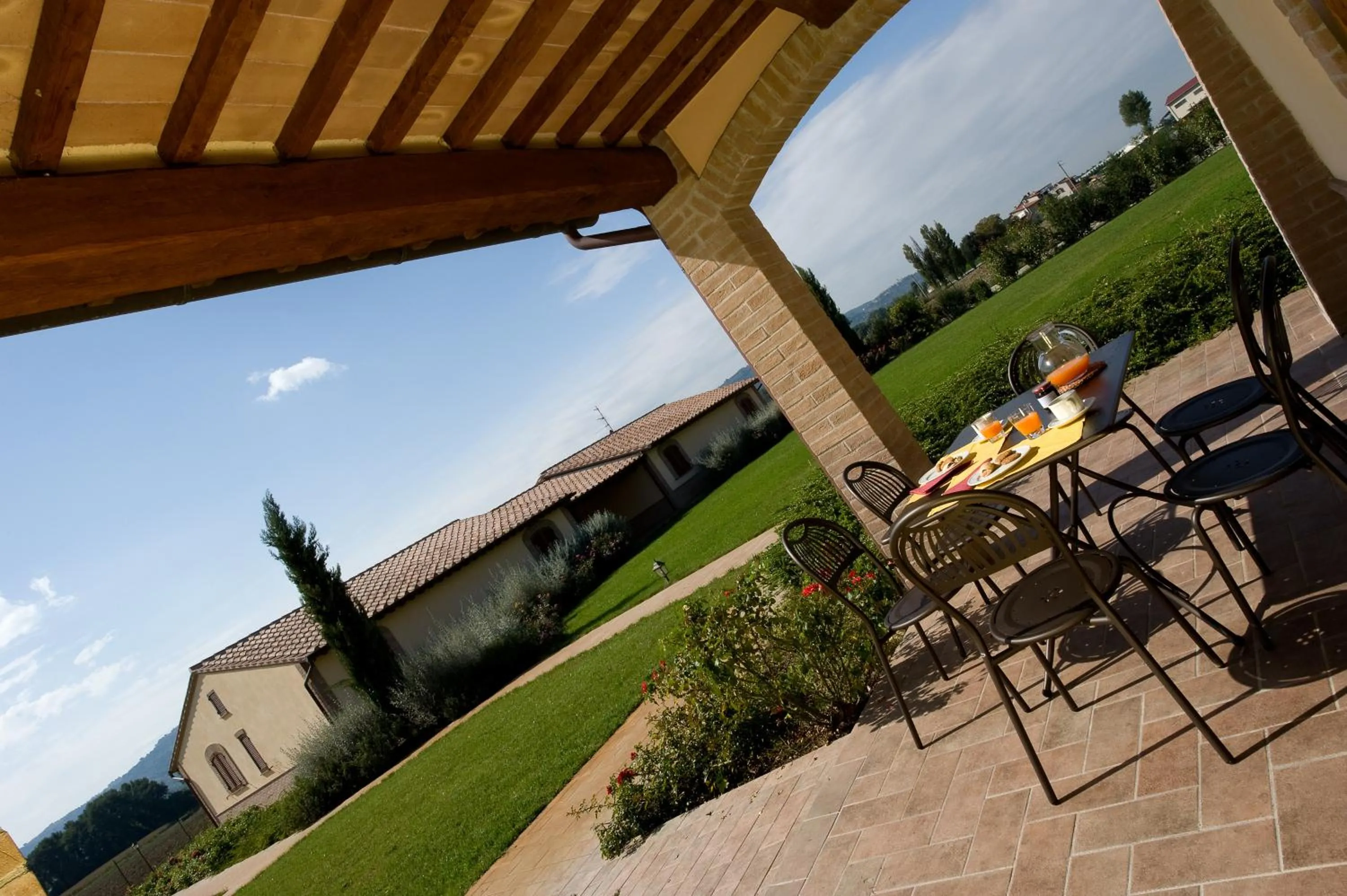 Garden view in Agriturismo Le Rondini Di Francesco Di Assisi