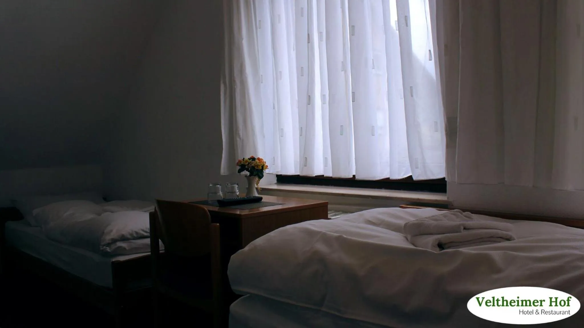 Photo of the whole room, Bed in Landgasthaus Veltheimer Hof