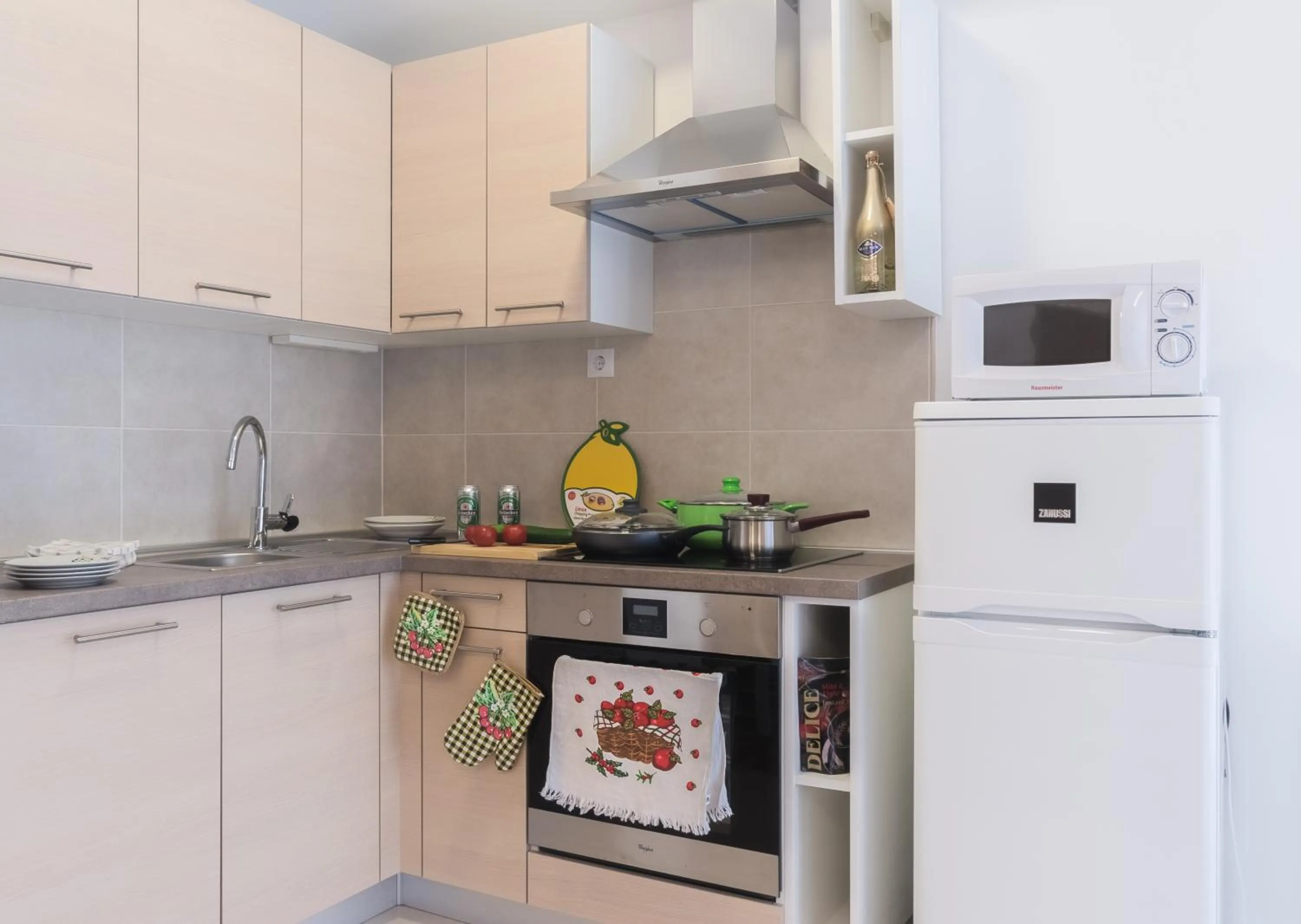 Kitchen or kitchenette in Corvin holiday Apartments hotel