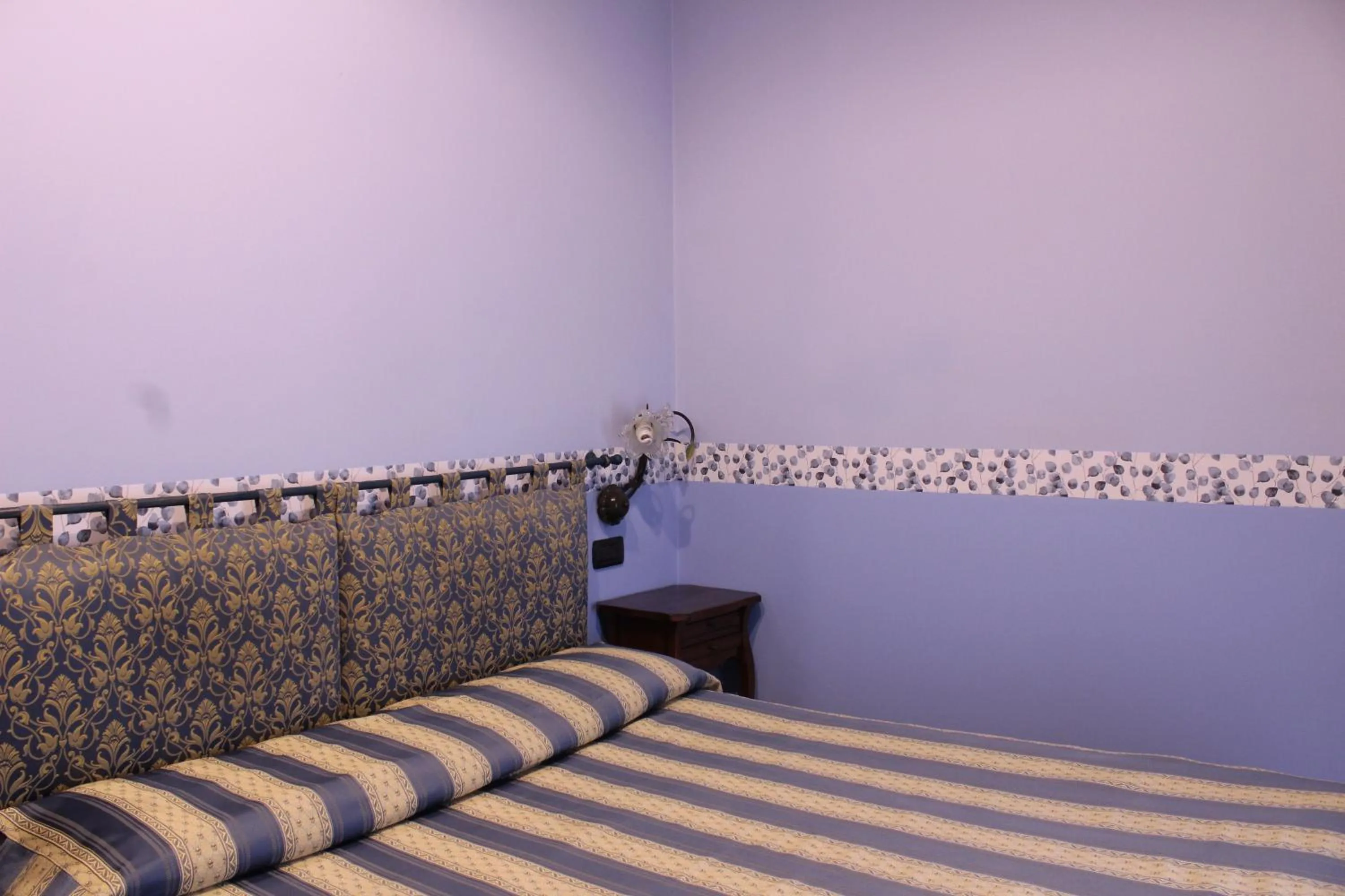 Bed in Hotel Belle Epoque