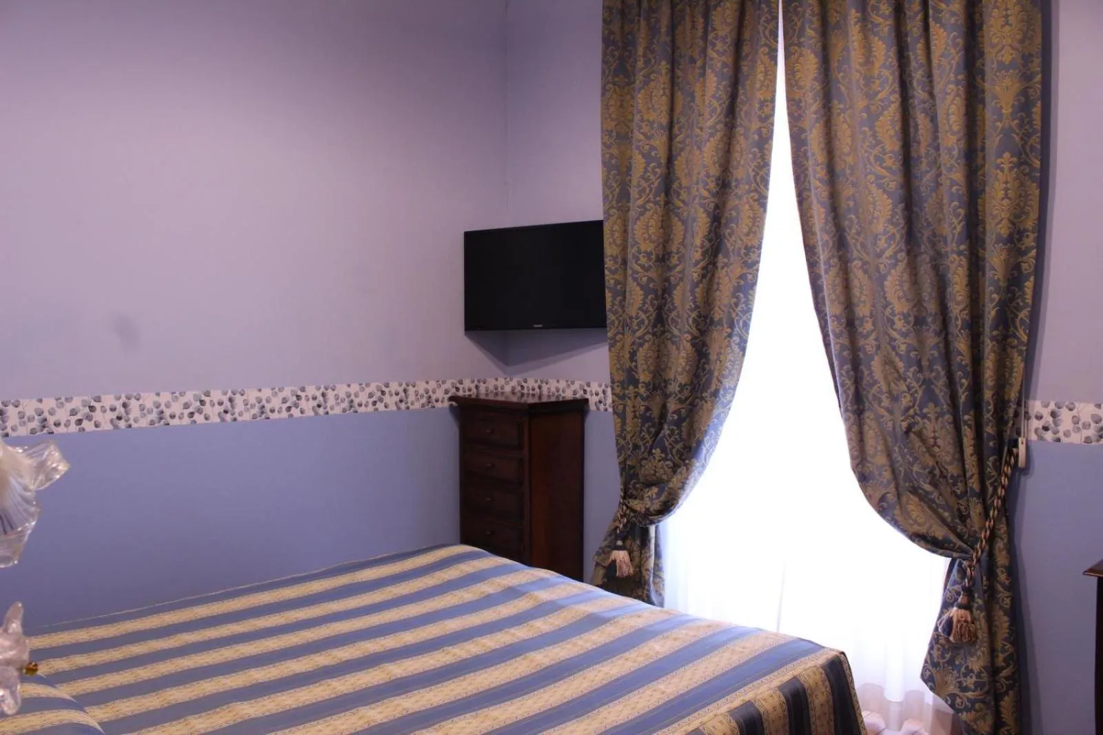 Bed in Hotel Belle Epoque