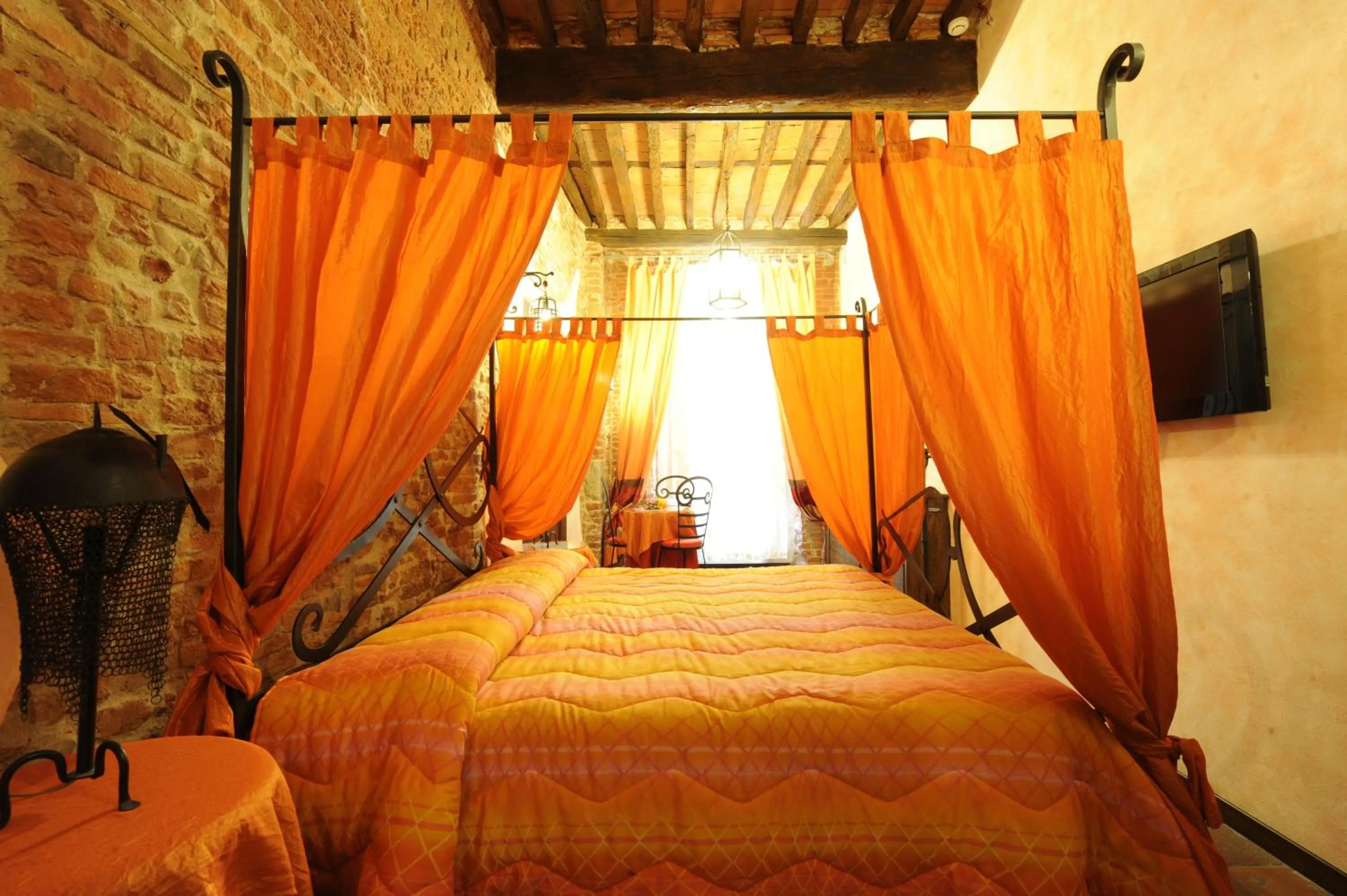 Bed in Antica Corte dei Principi Charming Rooms