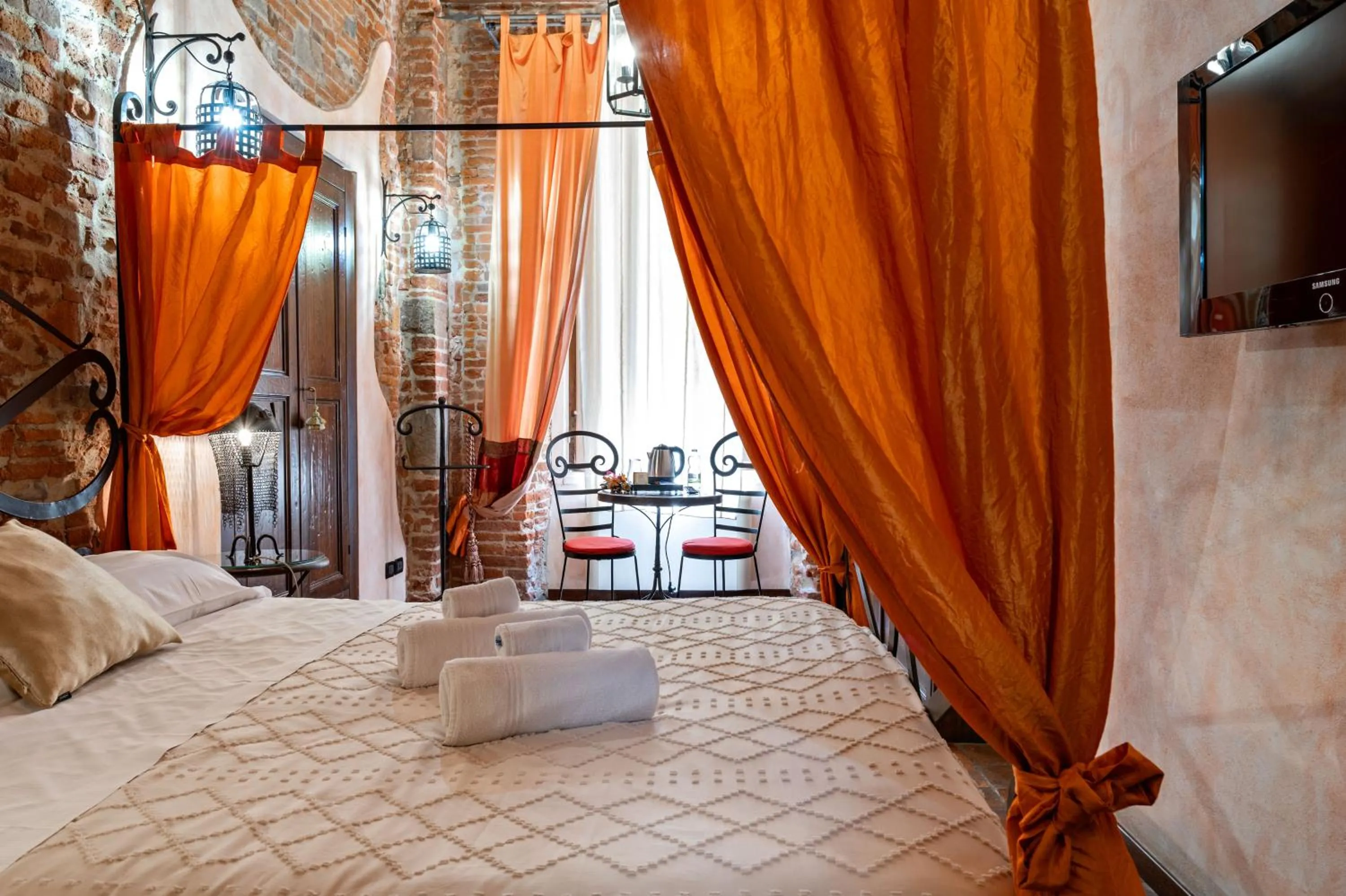 Bed in Antica Corte dei Principi Charming Rooms