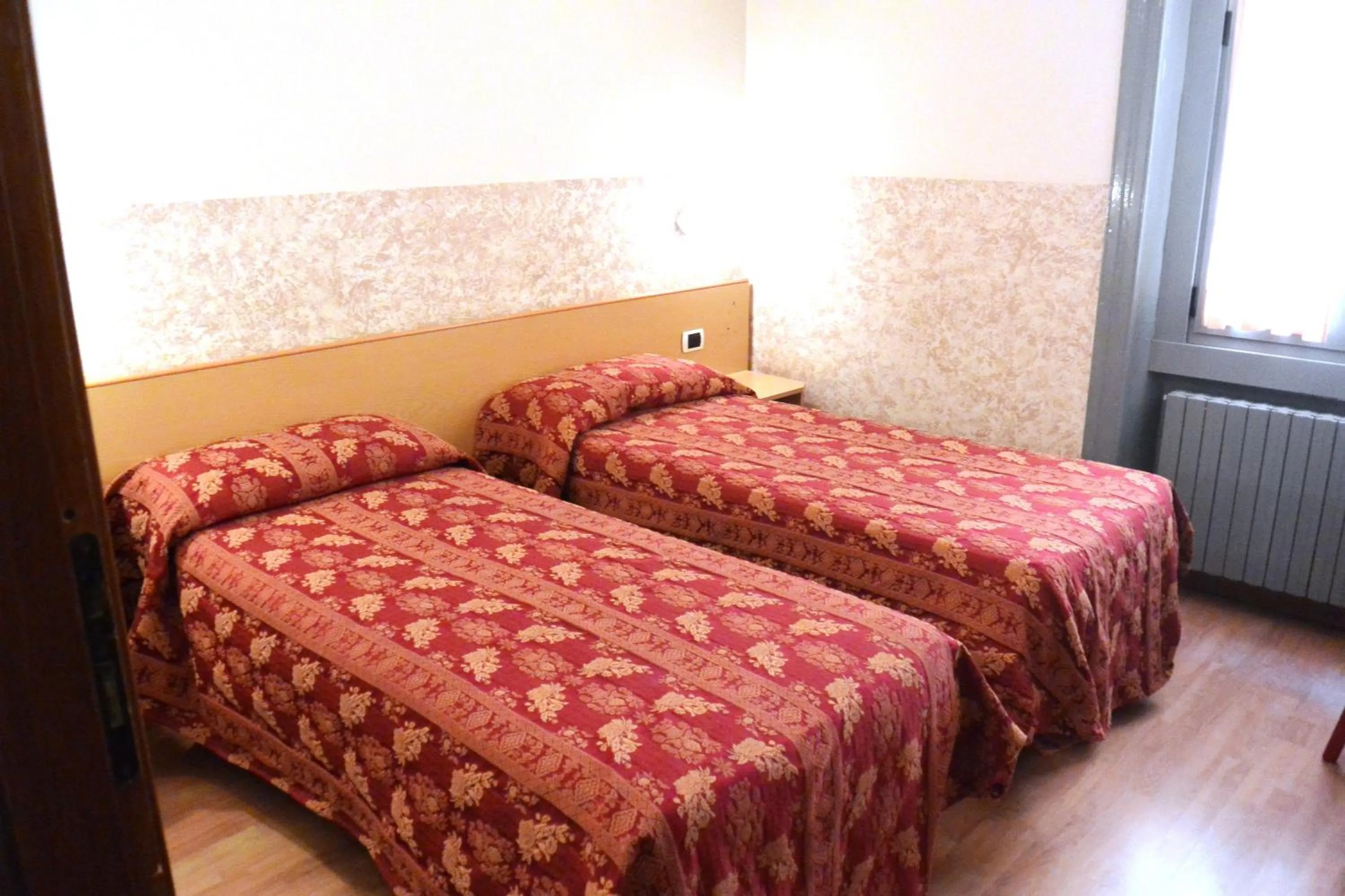 Bed in Hotel Nettuno