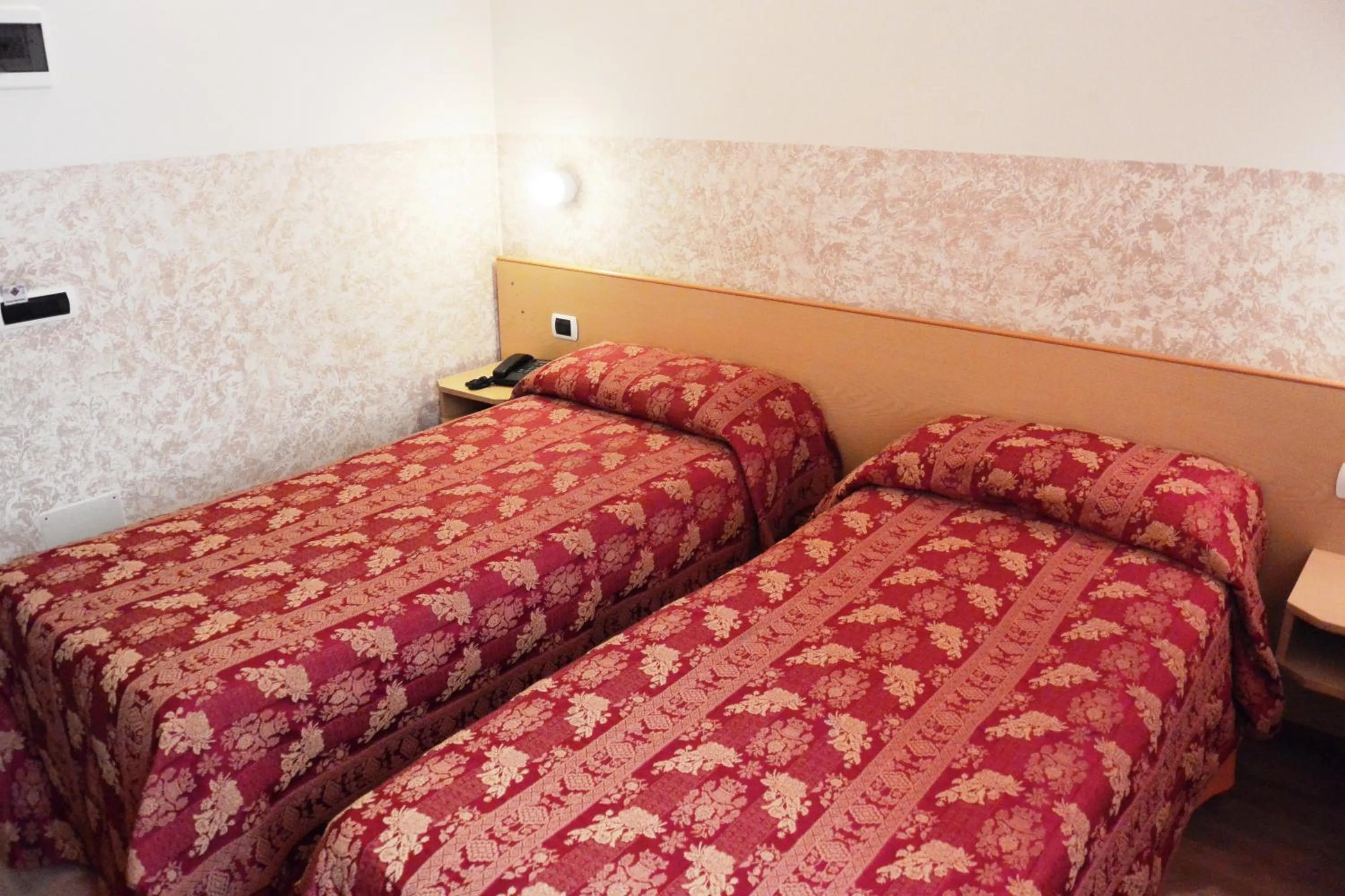 Bed in Hotel Nettuno