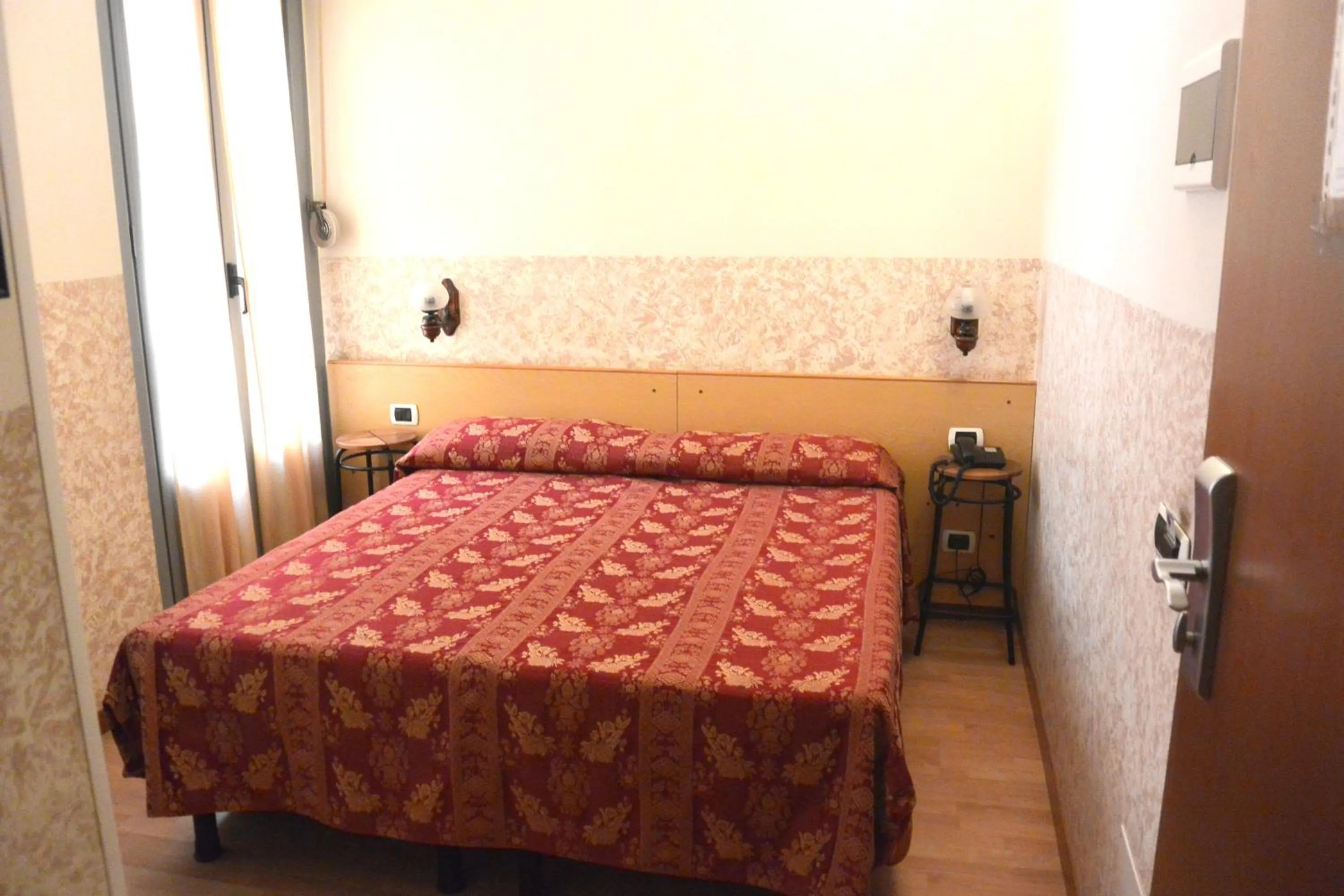 Bed in Hotel Nettuno