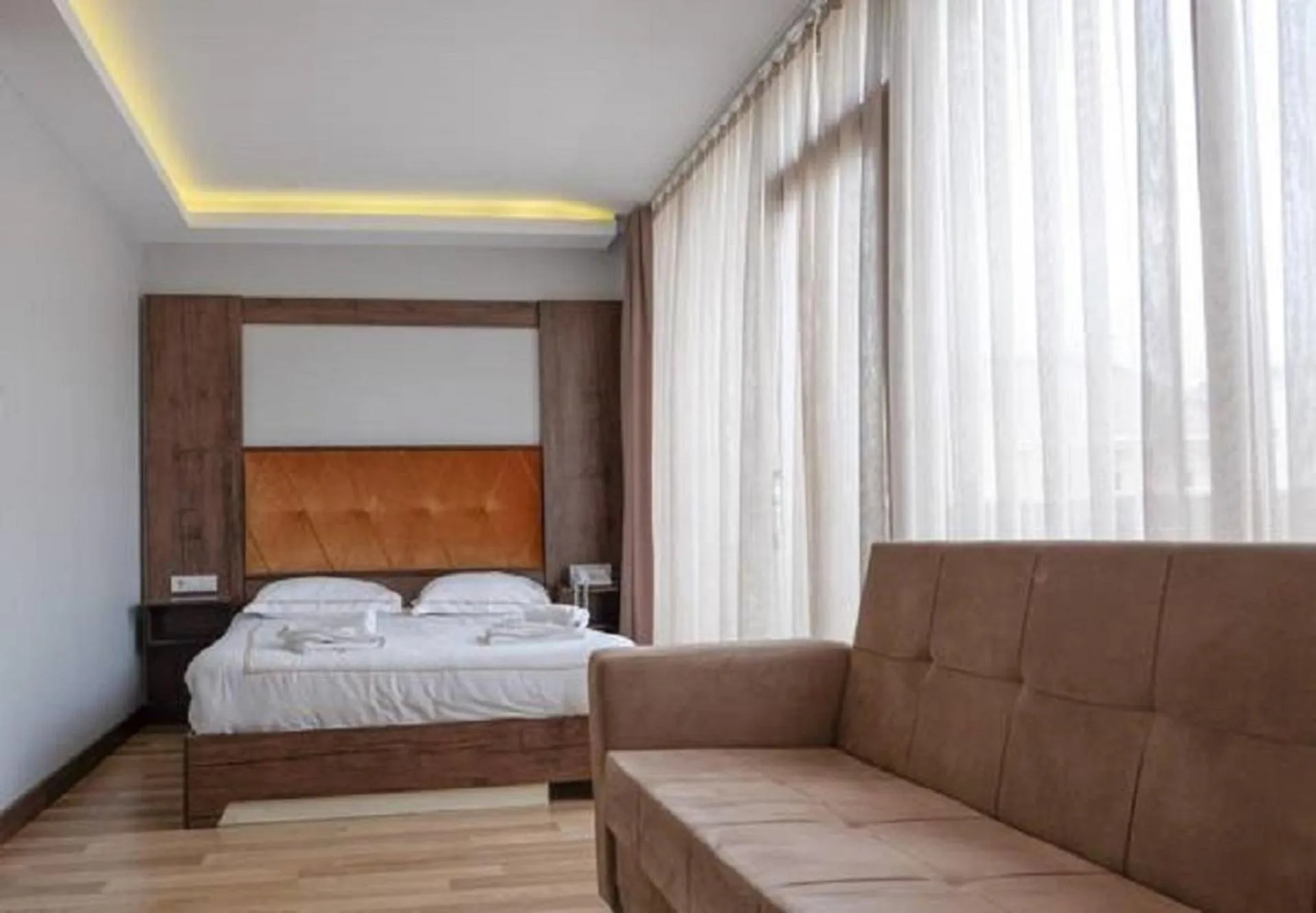 Photo of the whole room, Bed in Bucoleon by Cheers