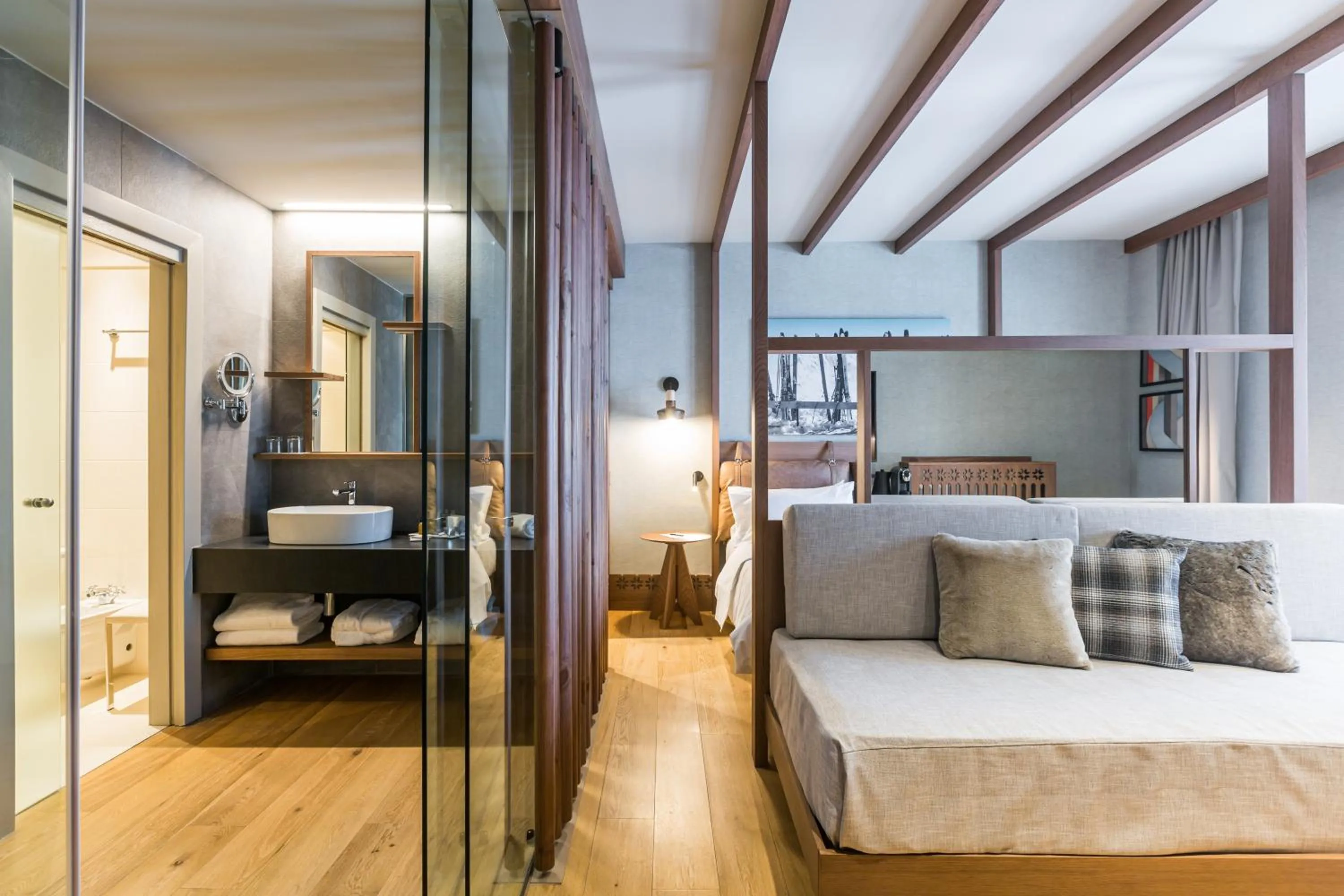 Seating area, Bed in Grand Hotel Savoia Cortina d'Ampezzo, A Radisson Collection Hotel