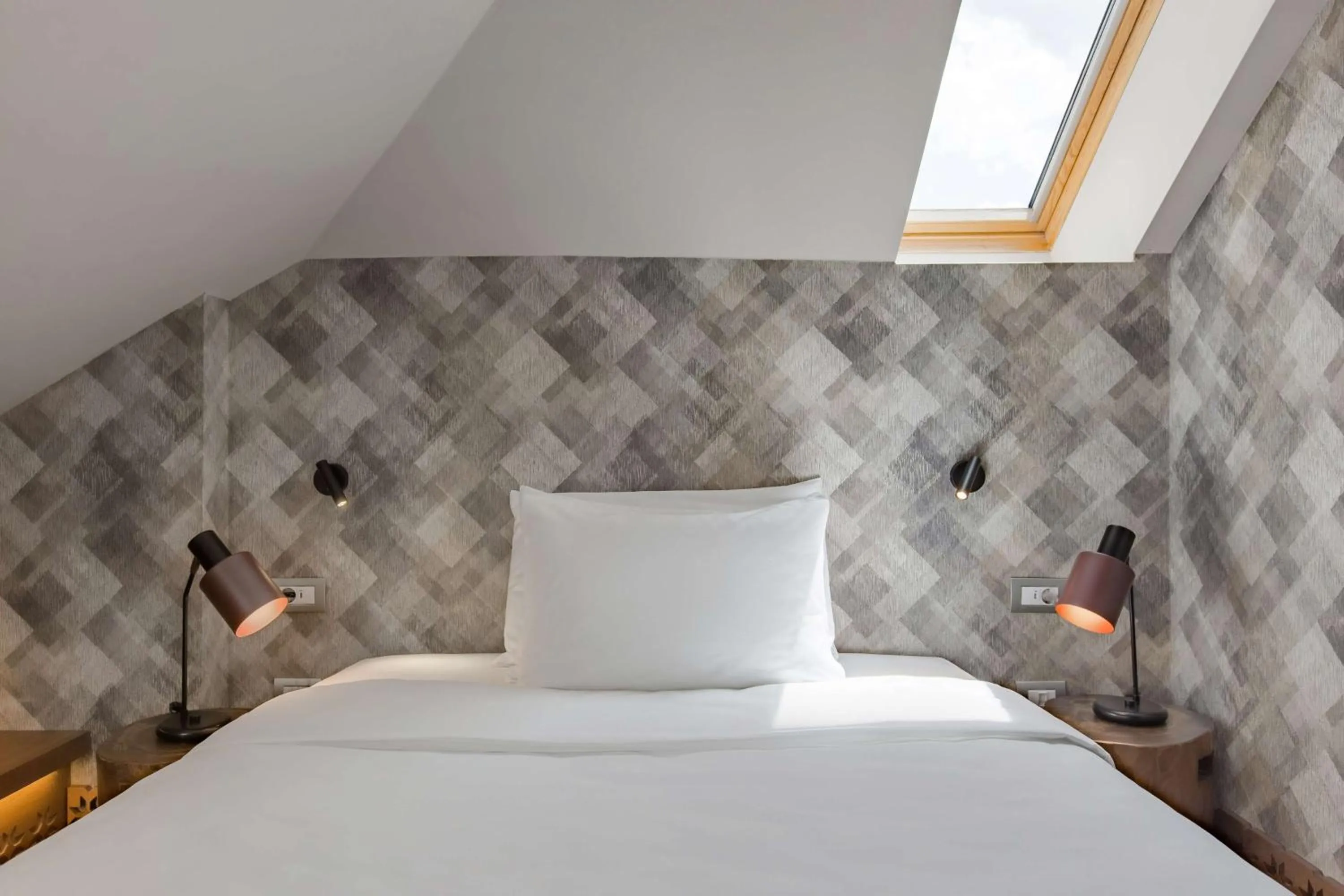 Photo of the whole room, Bed in Grand Hotel Savoia Cortina d'Ampezzo, A Radisson Collection Hotel