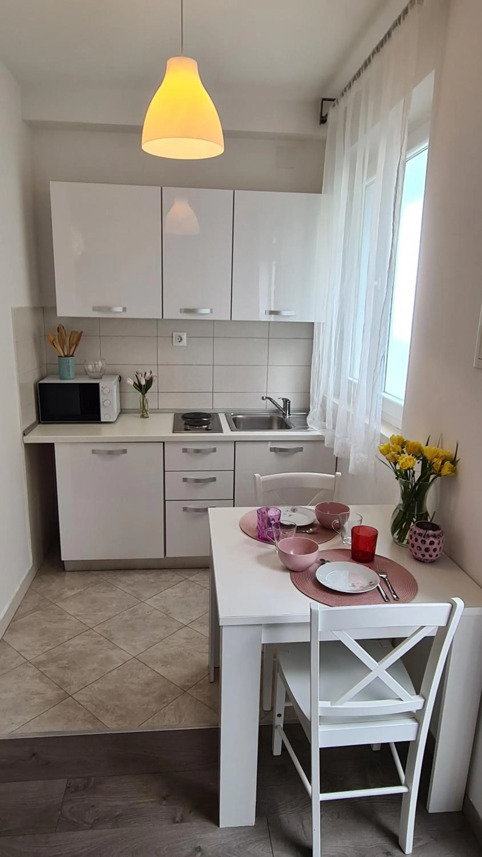 Kitchen or kitchenette in Cin&Co Central Apartments