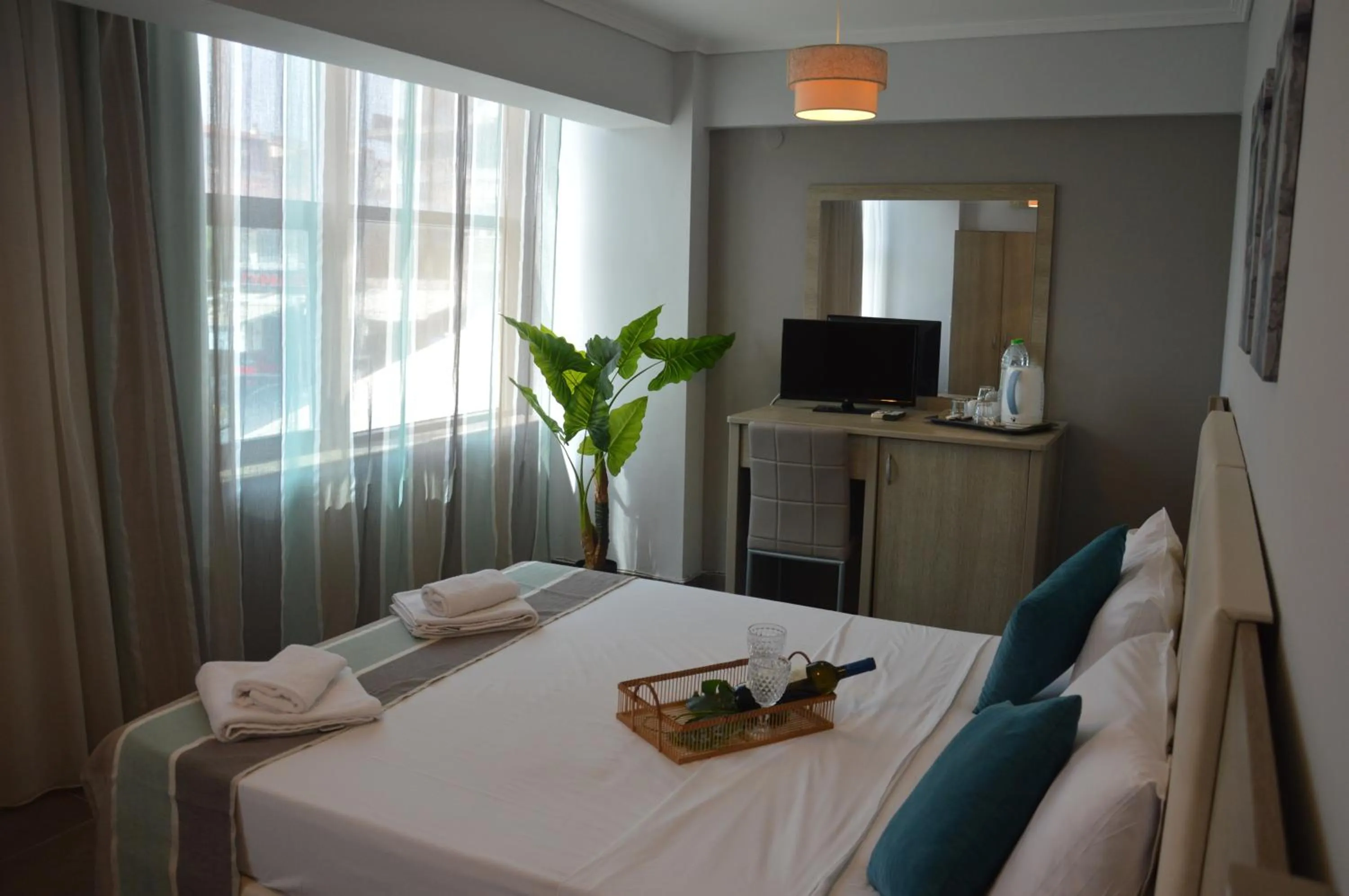 TV and multimedia, Bed in Aqua Mare Sea Side Rooms