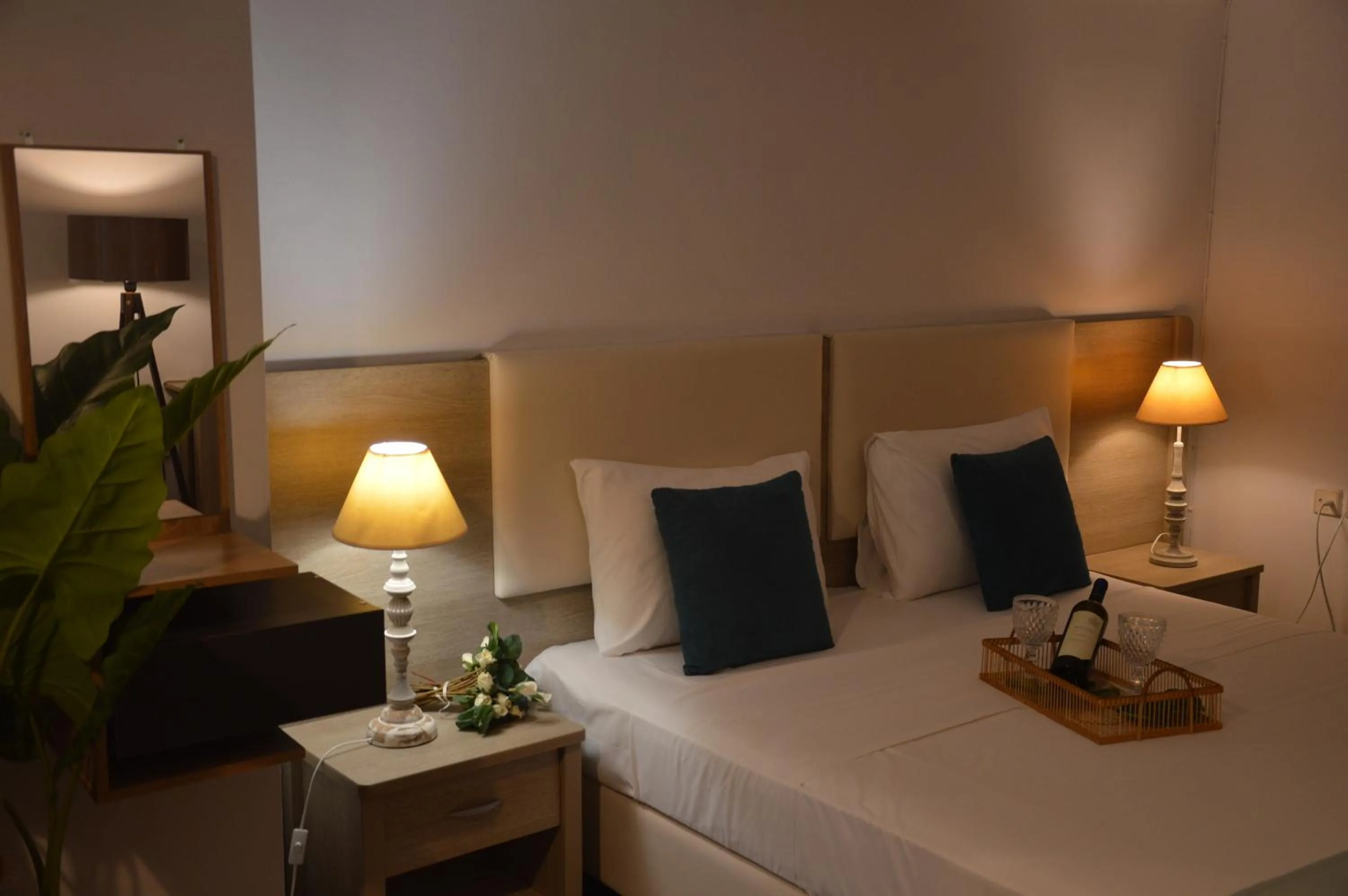 Bed in Aqua Mare Sea Side Rooms