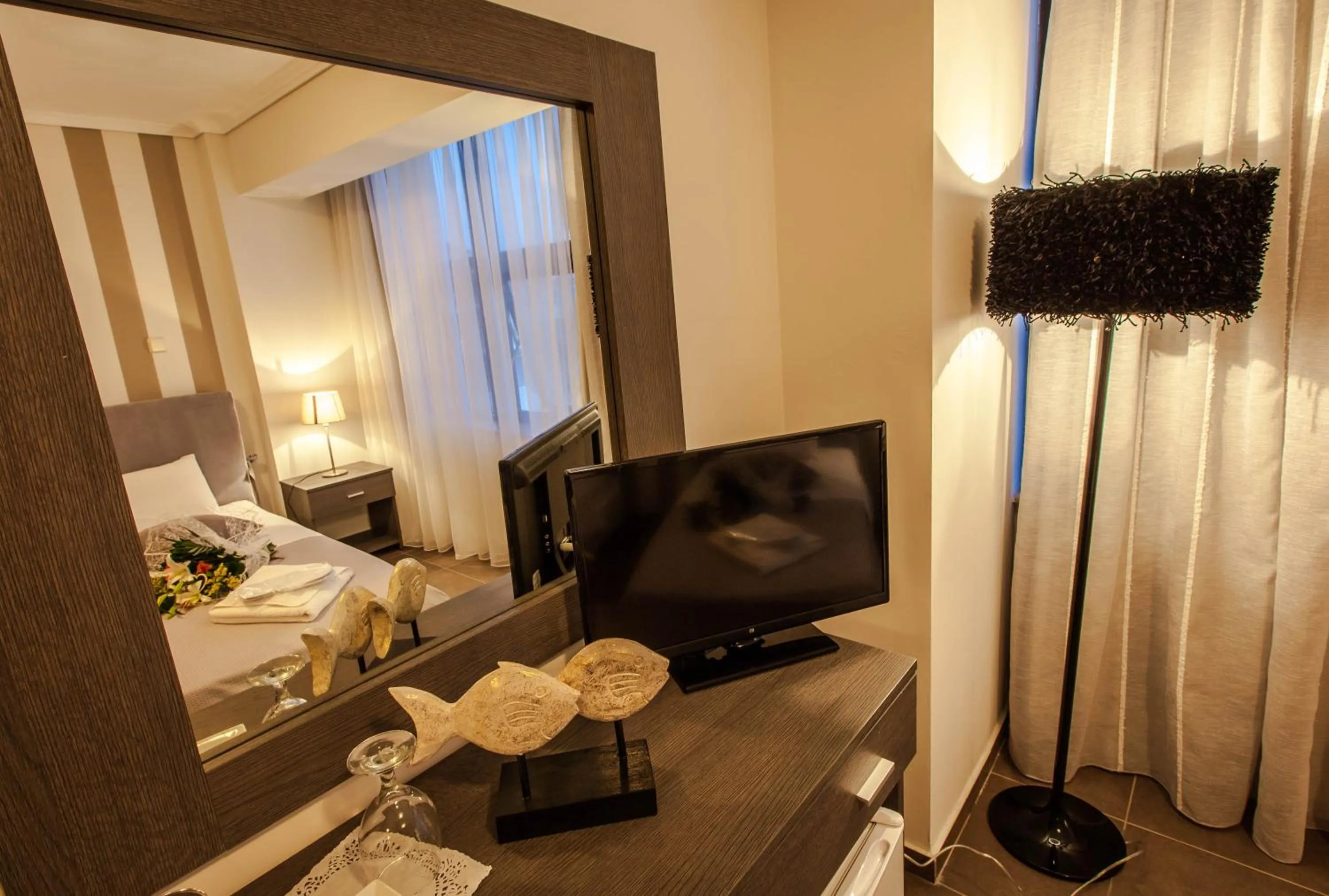 TV and multimedia in Aqua Mare Sea Side Rooms