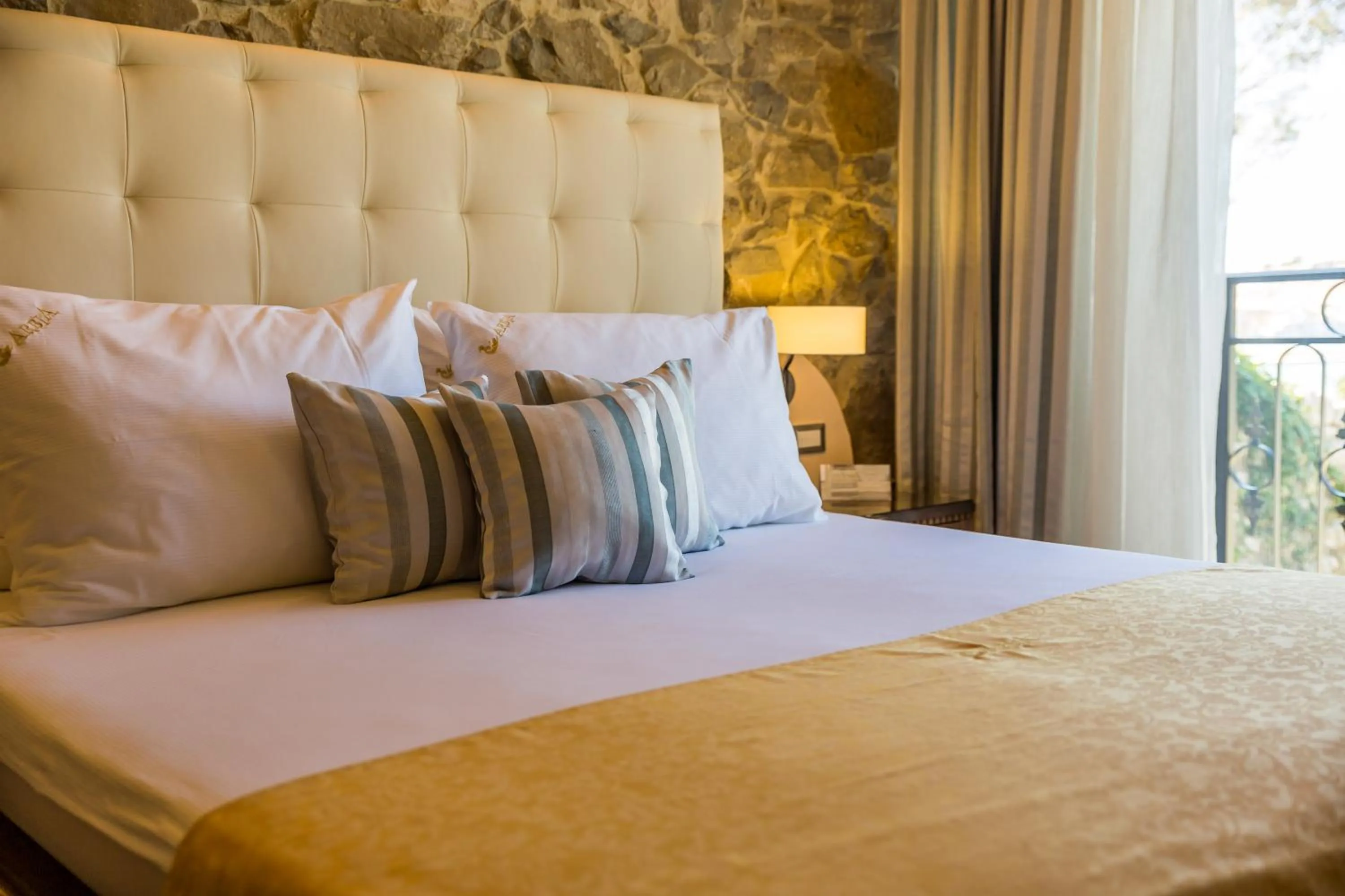 Bed in Villas Arbia - Margita Deluxe Beach Hotel