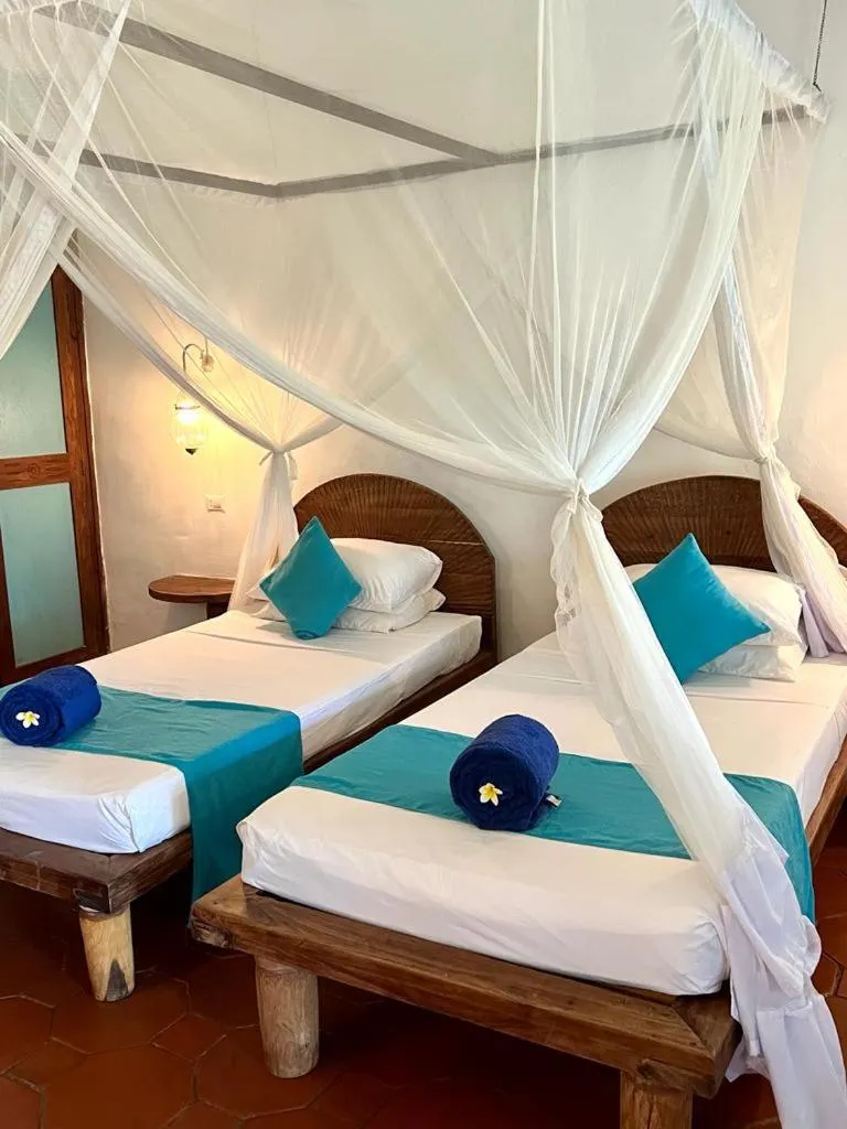 Bed in Hotel Club Dongwe