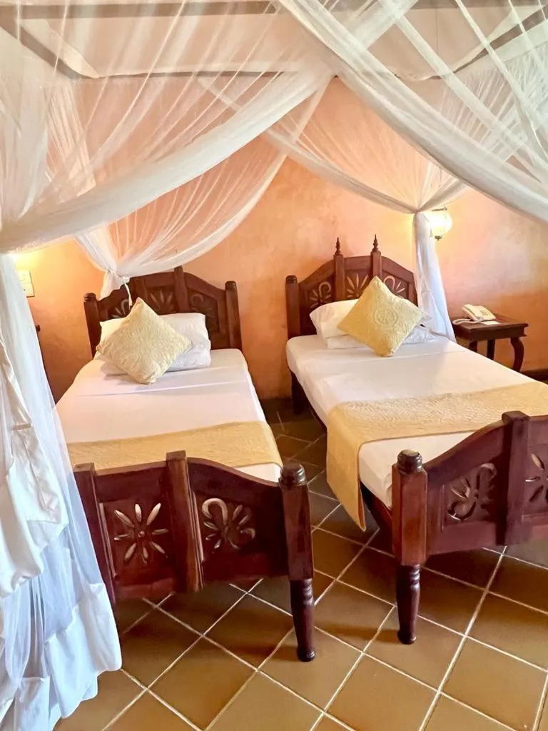 Bed in Hotel Club Dongwe