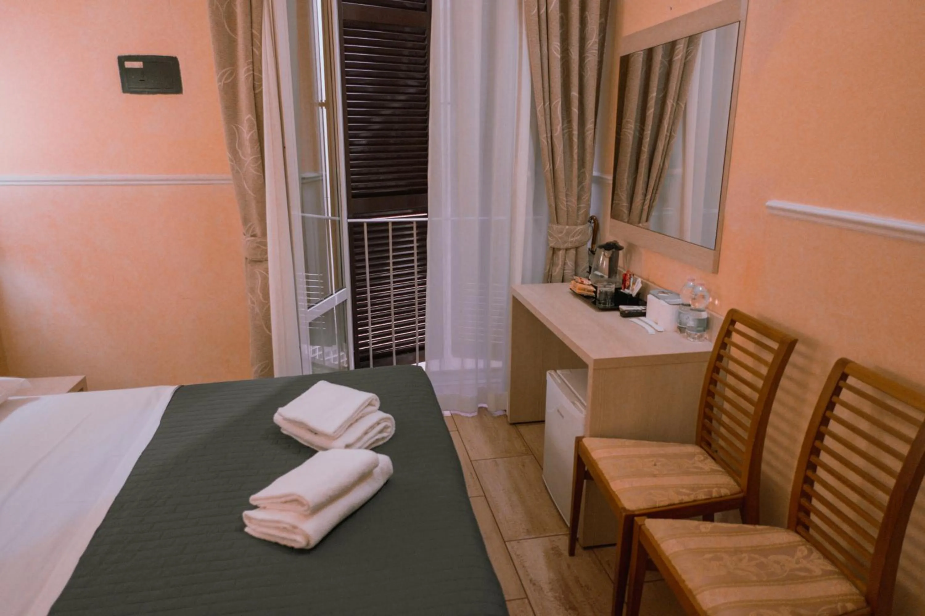 Bed in Hotel Aristotele