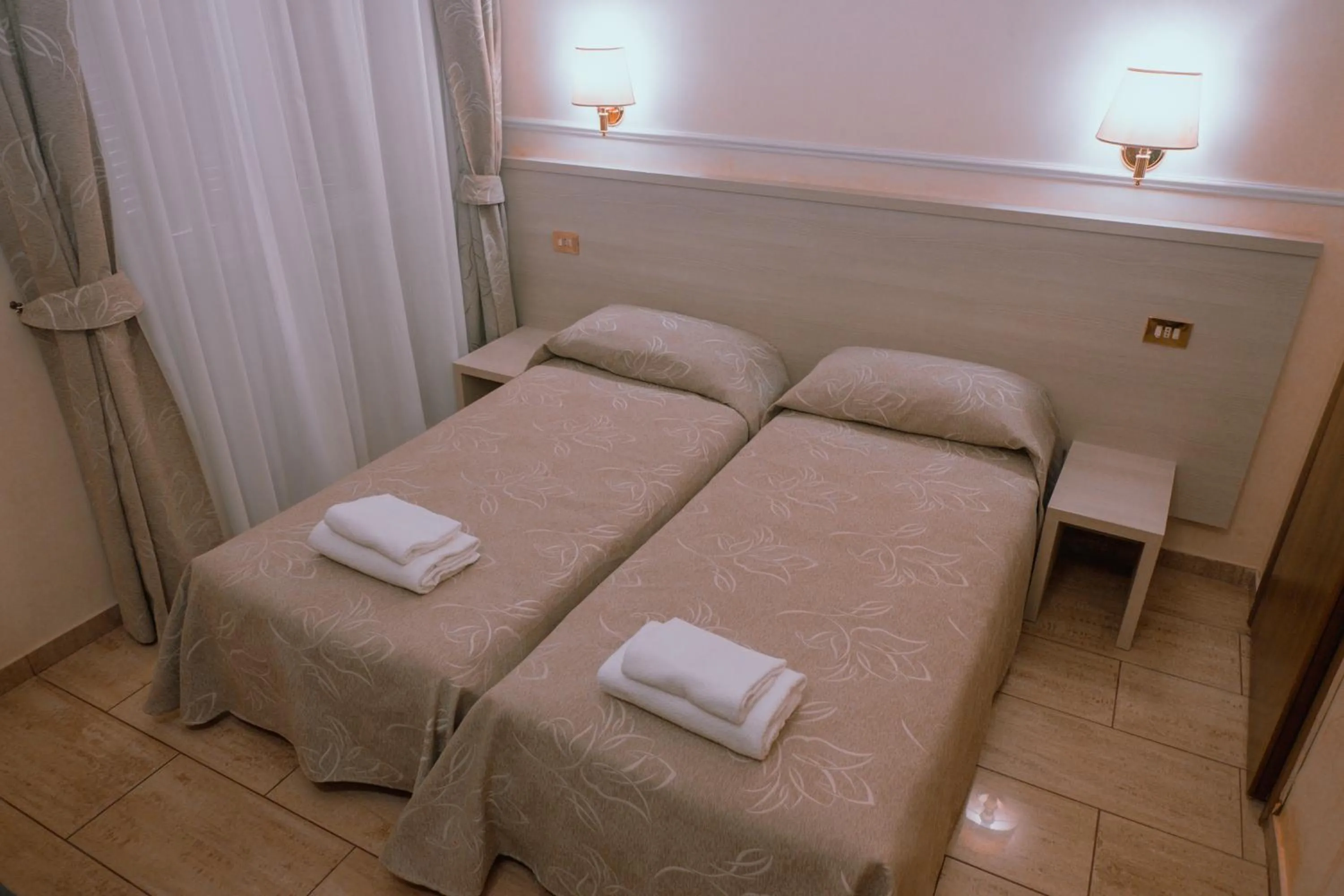 Bed in Hotel Aristotele